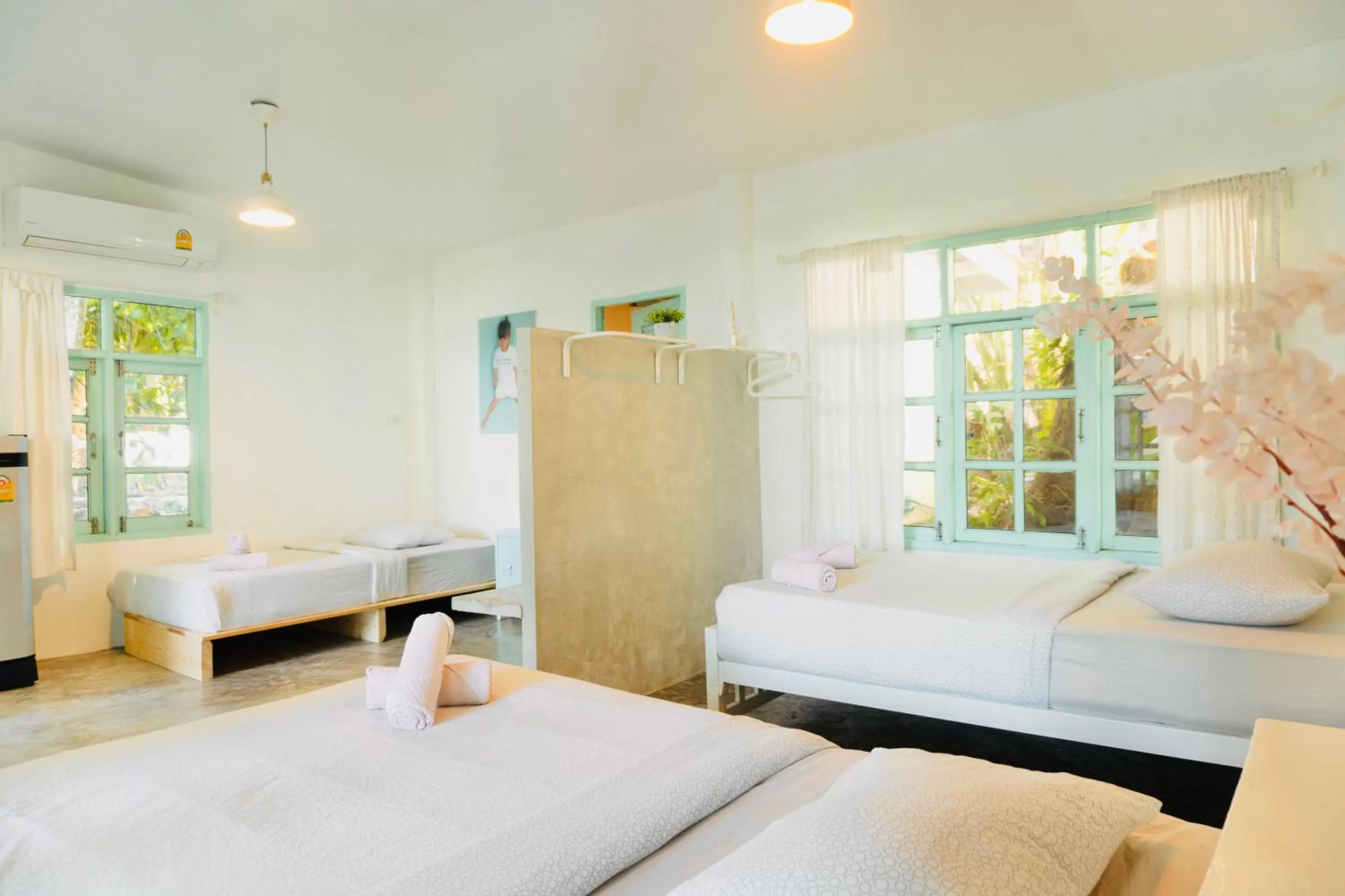 Bed in Indie Beach Bungalows