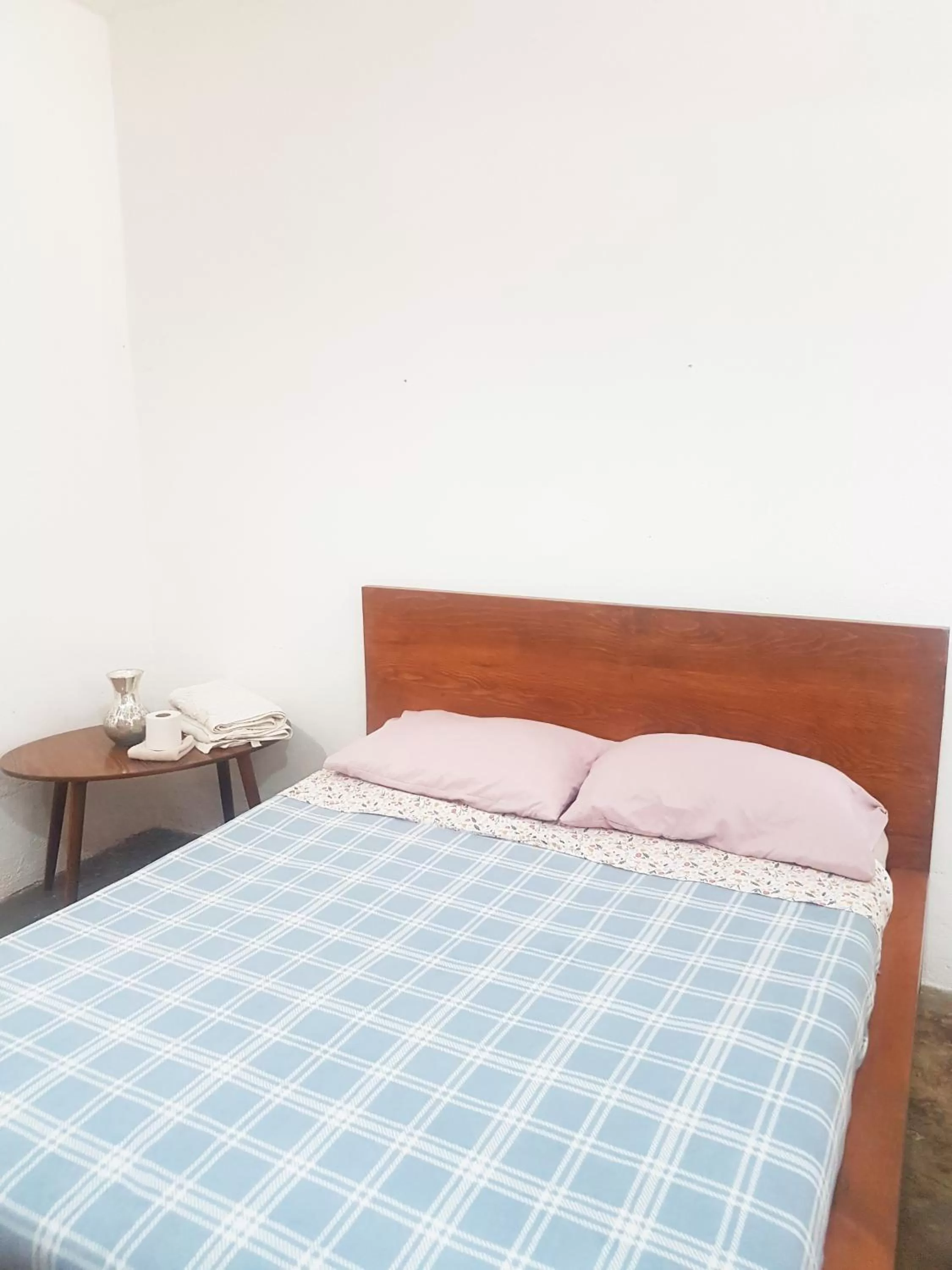 Bed in Hostal Hoja Santa