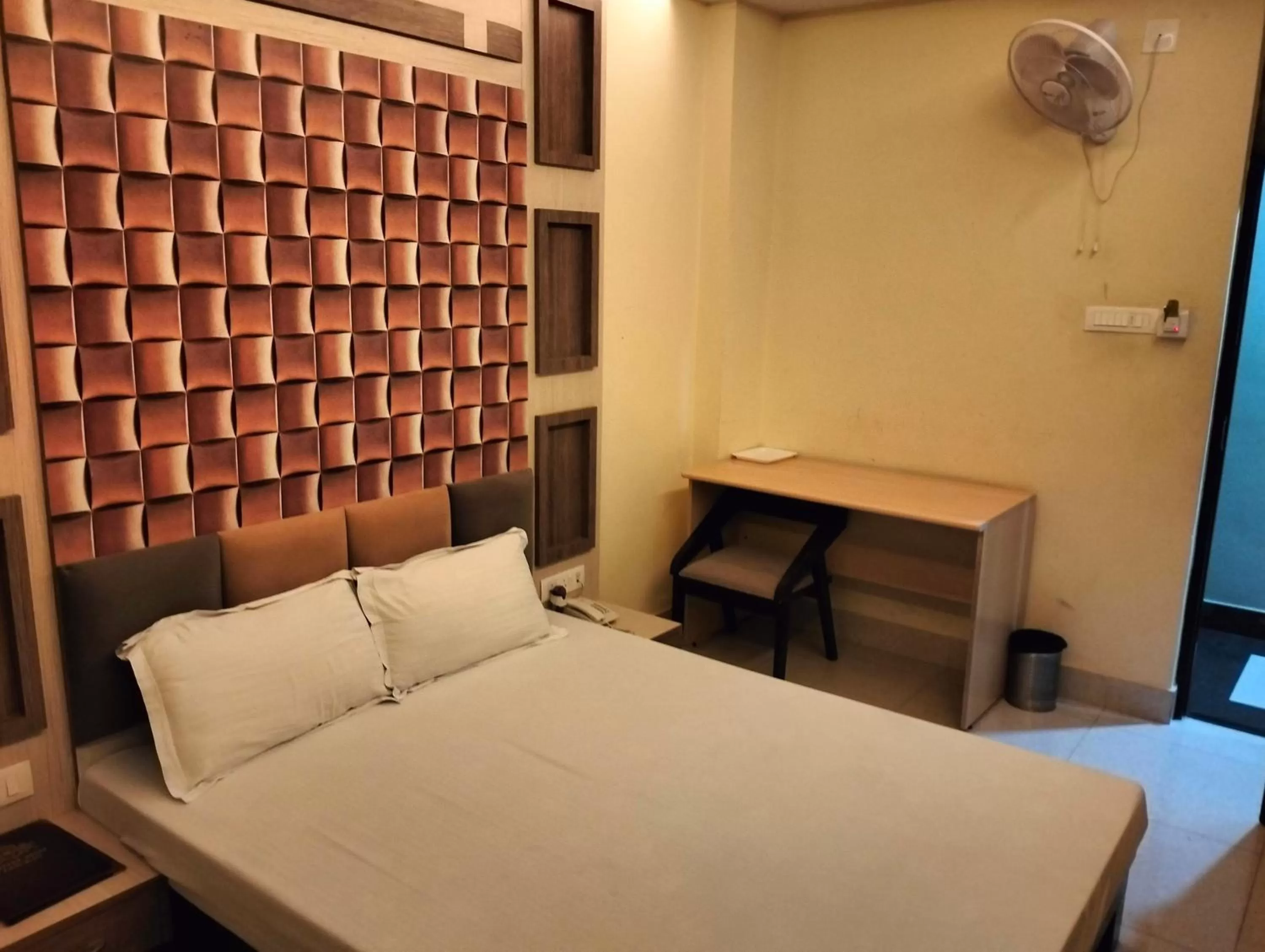 Bed in Hotel Shri Gourav