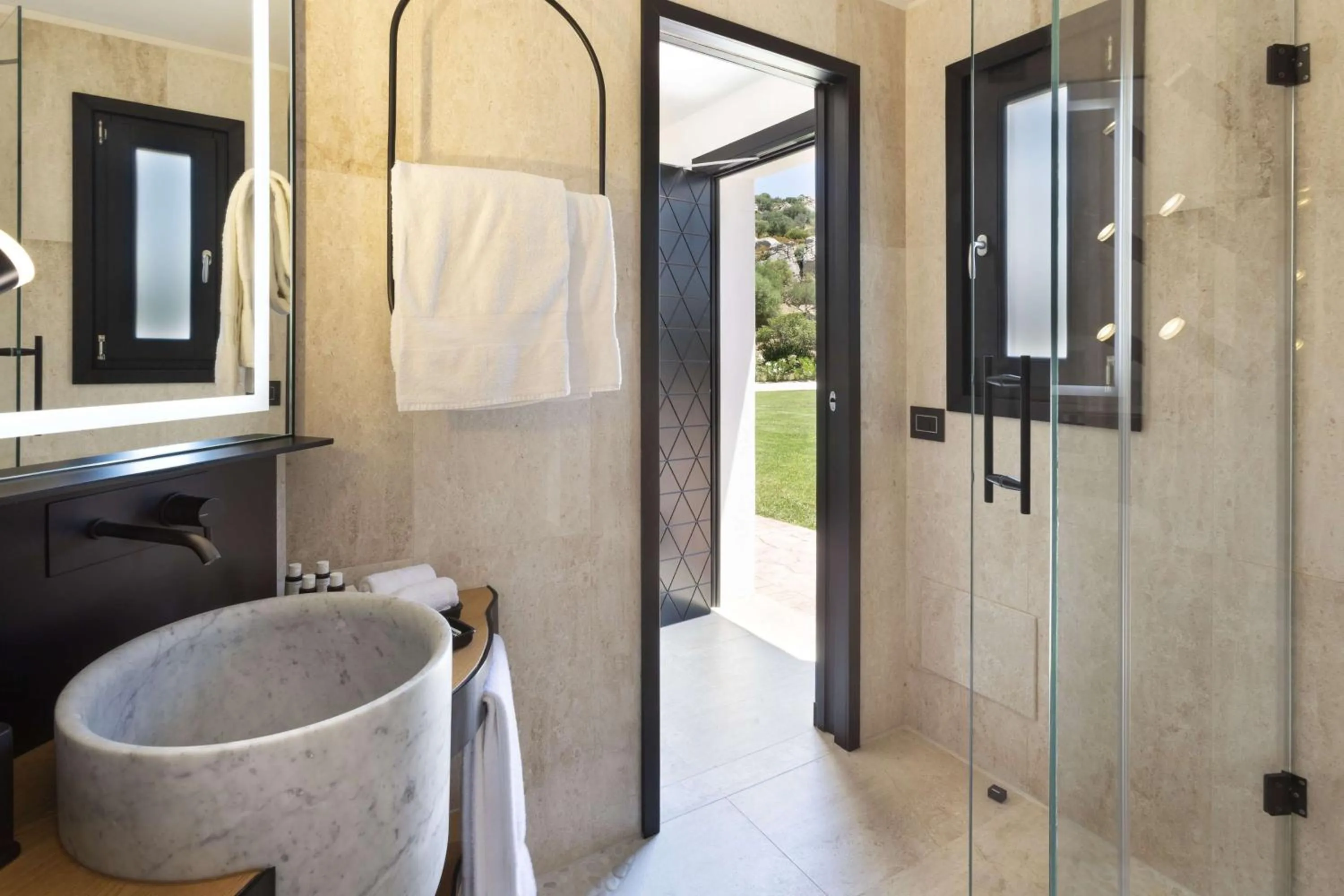 Bathroom in Sulià House Porto Rotondo, Curio Collection by Hilton
