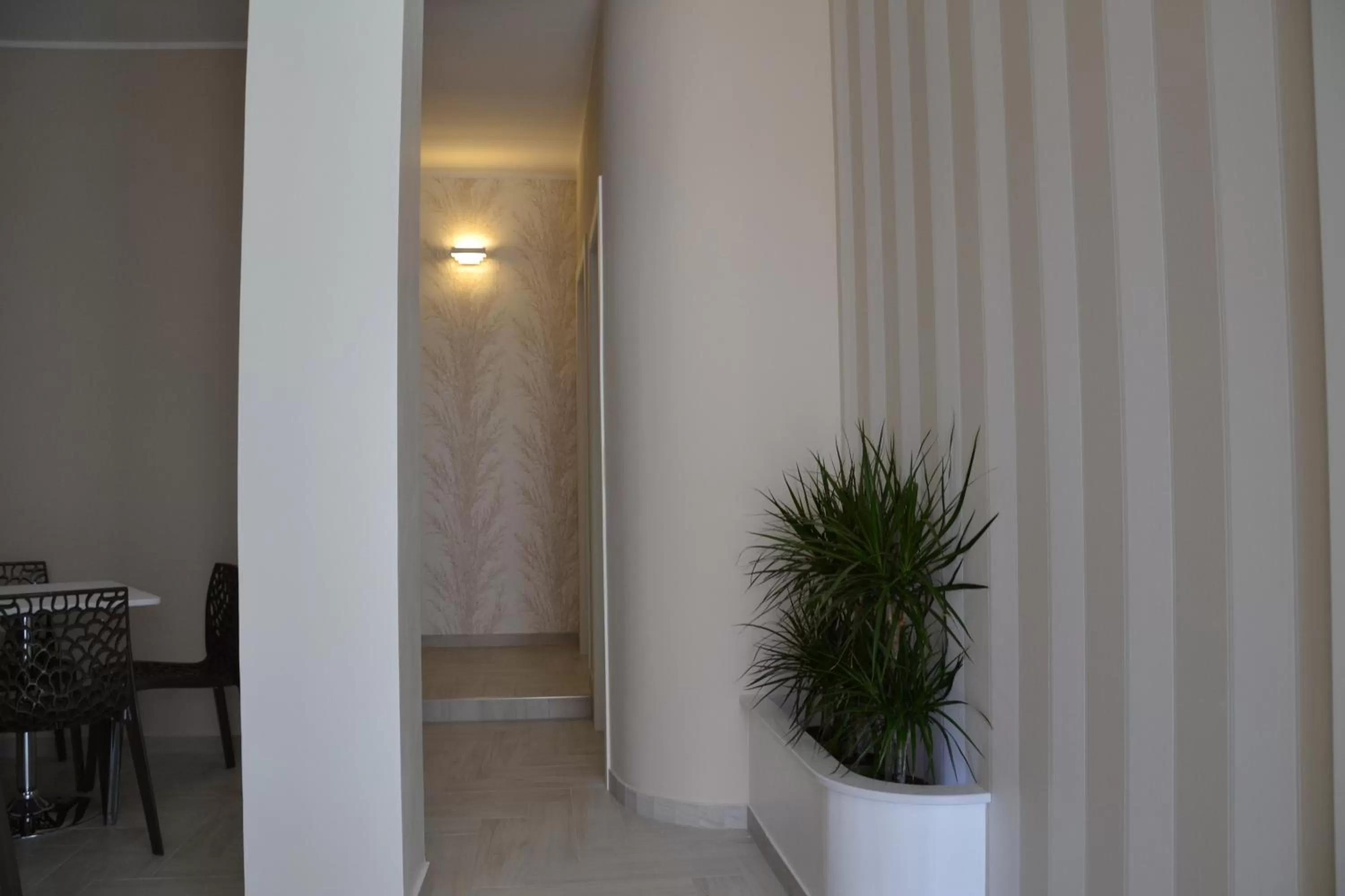 Communal lounge/ TV room in B&B Terra d'Oriente