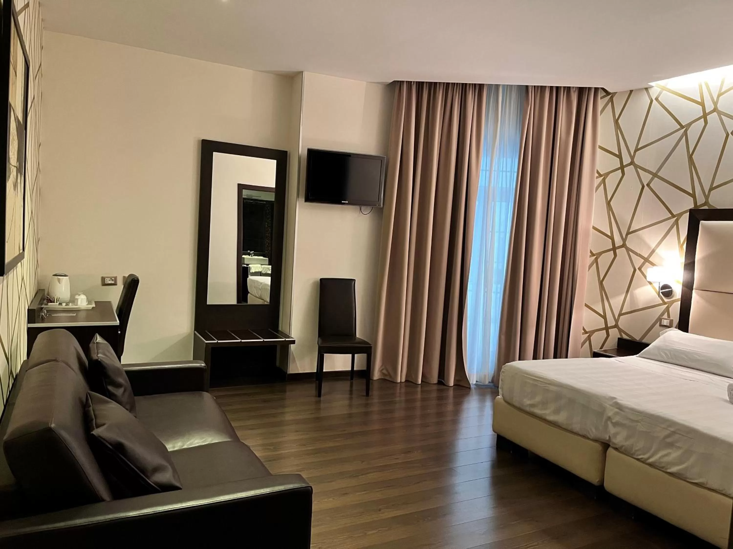 Photo of the whole room in Catone District Hotel