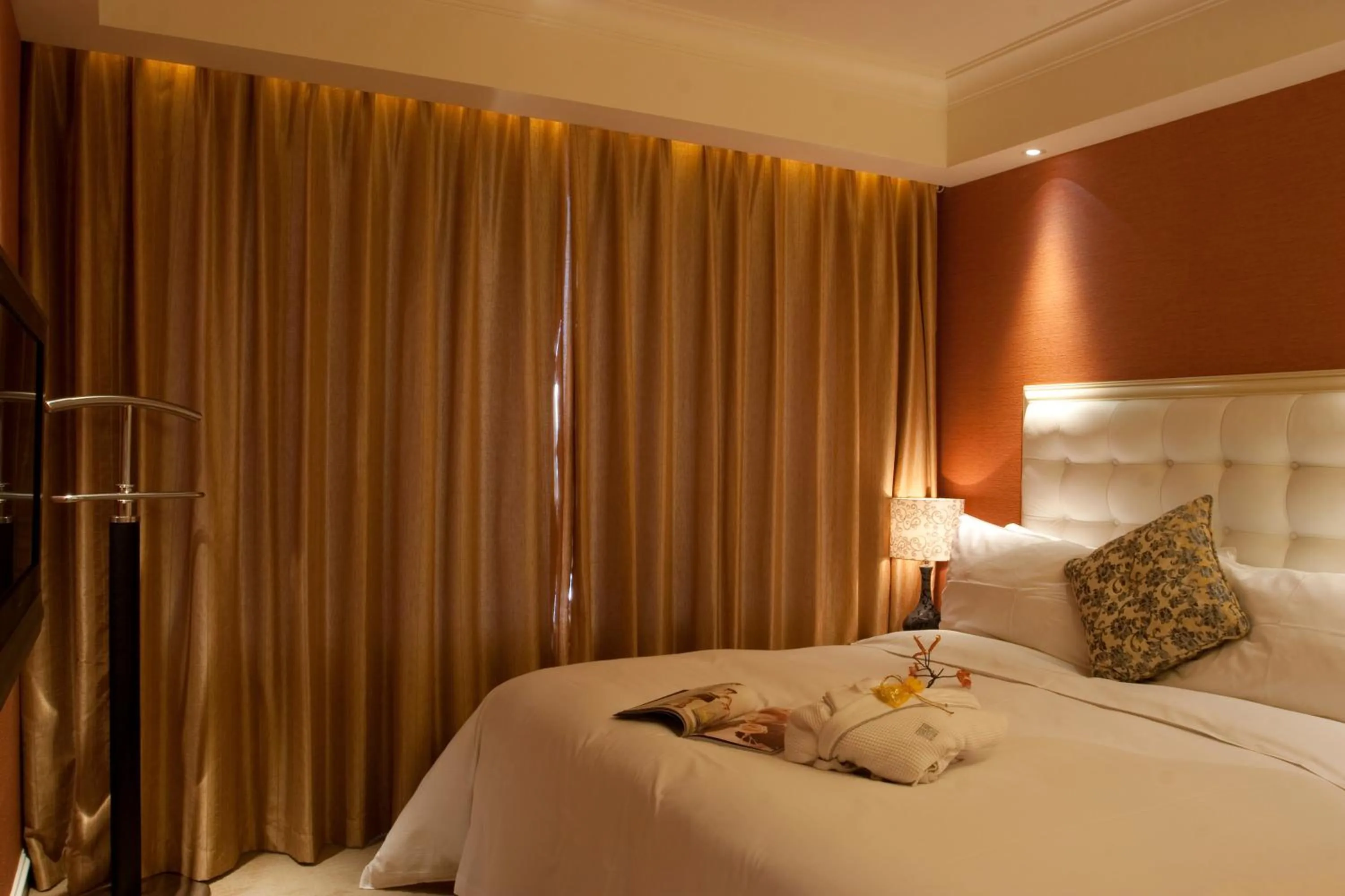 Bedroom in Wealthy All Suite Hotel Suzhou