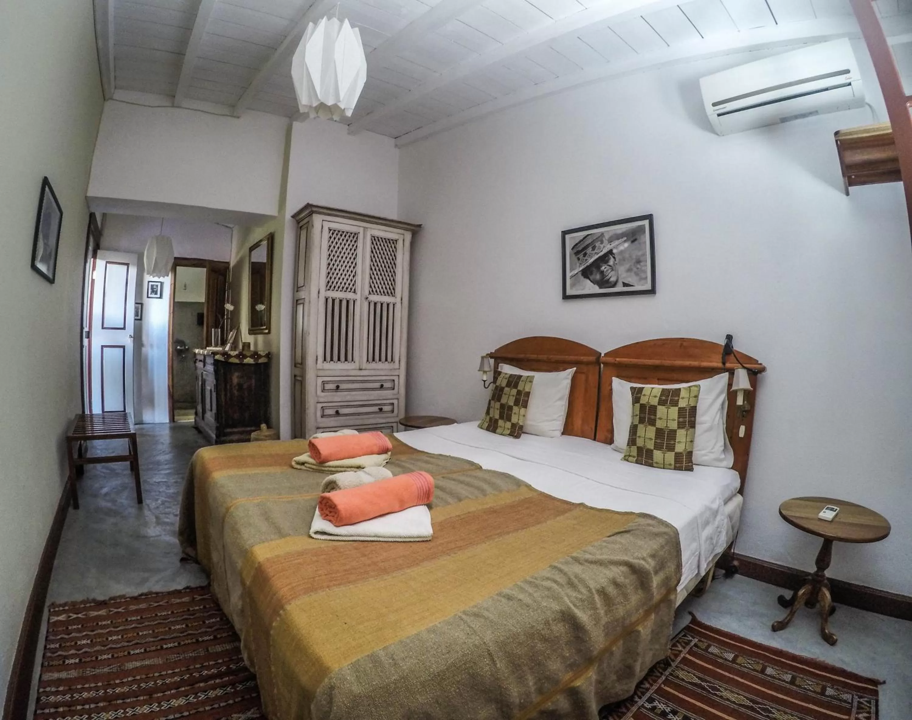 Bed in The Colonial Guest House