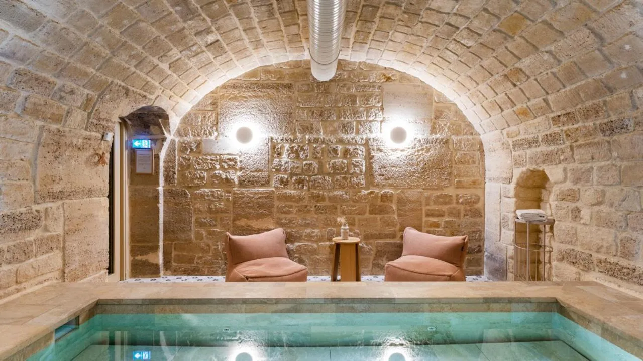 Swimming pool in Le Petit Beaumarchais Hotel & Spa