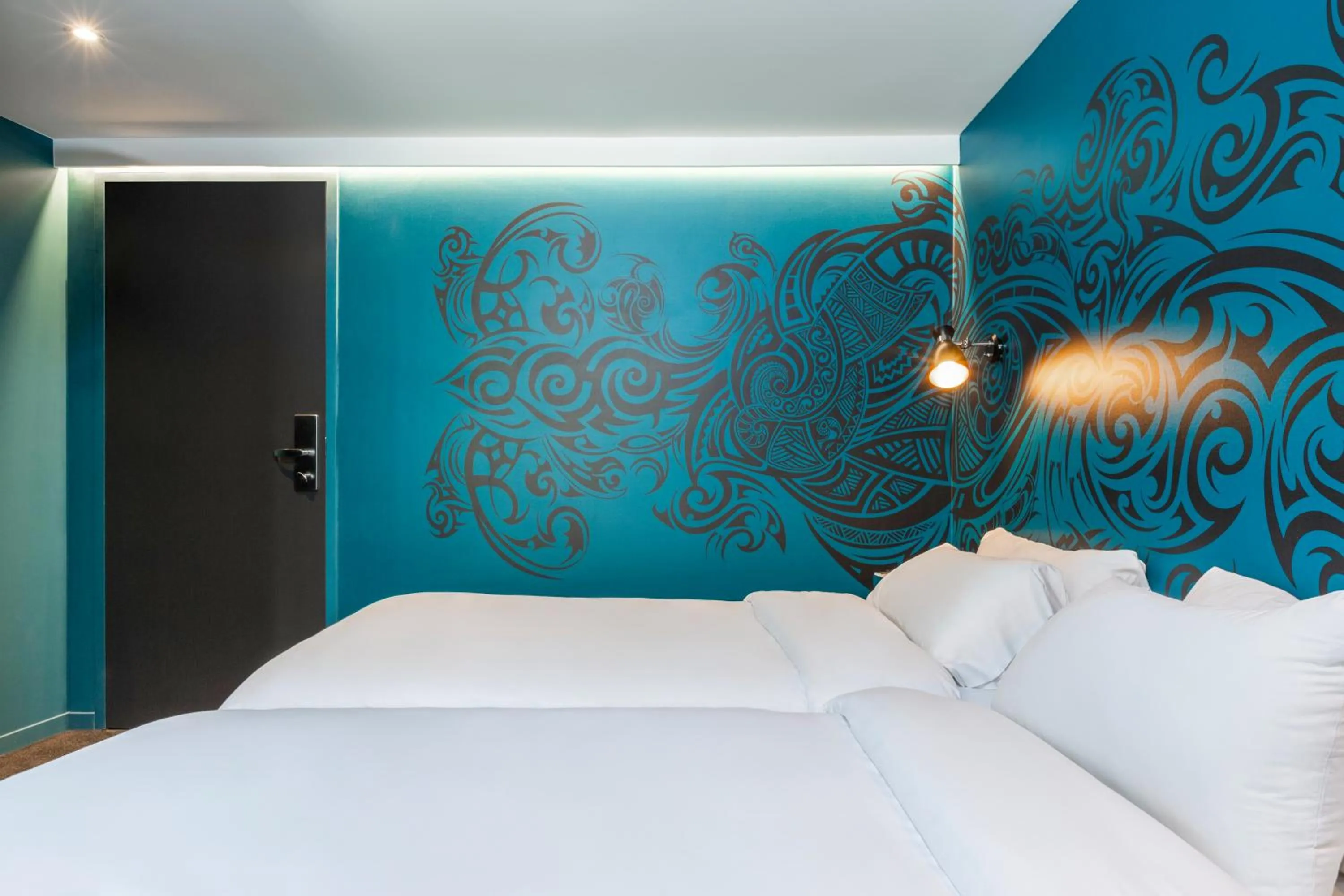 Photo of the whole room, Bed in Ibis Styles Paris Gare de l'Est Magenta