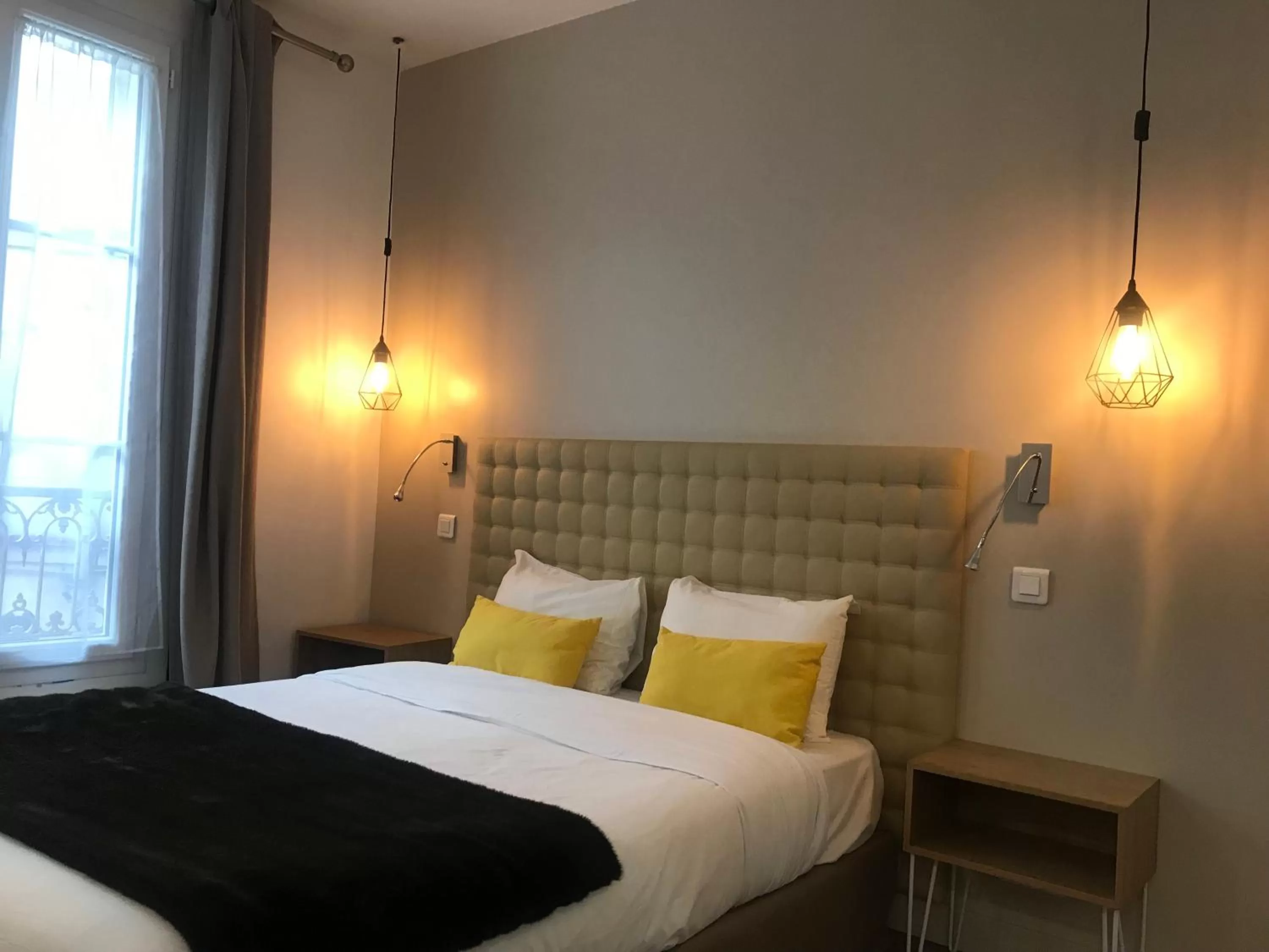 Bed in Hôtel De Venise