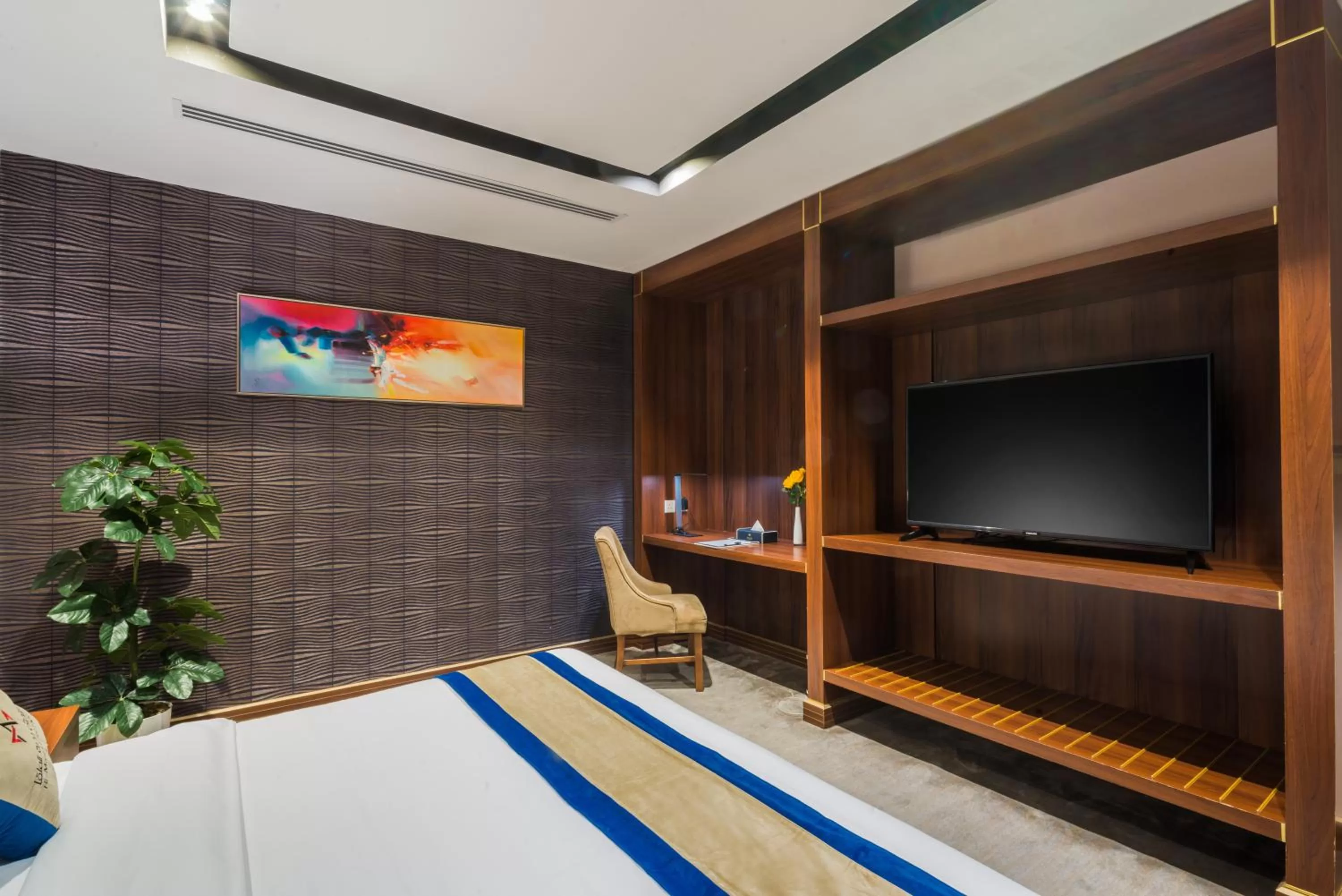 Bed in Al Malqa Elite Hotel