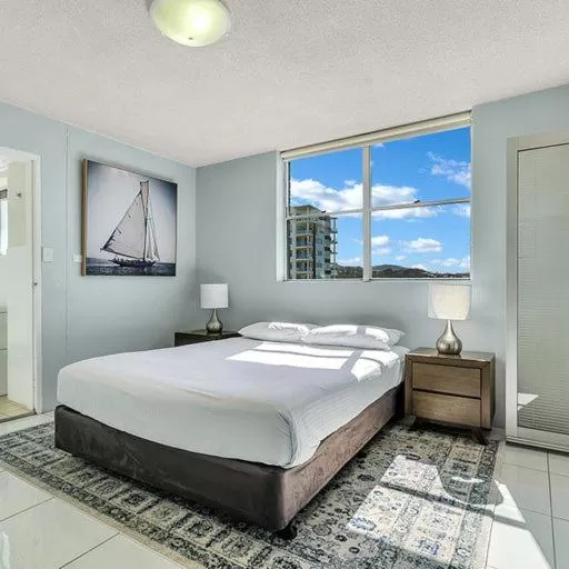 Bed in Tradewinds Apartments