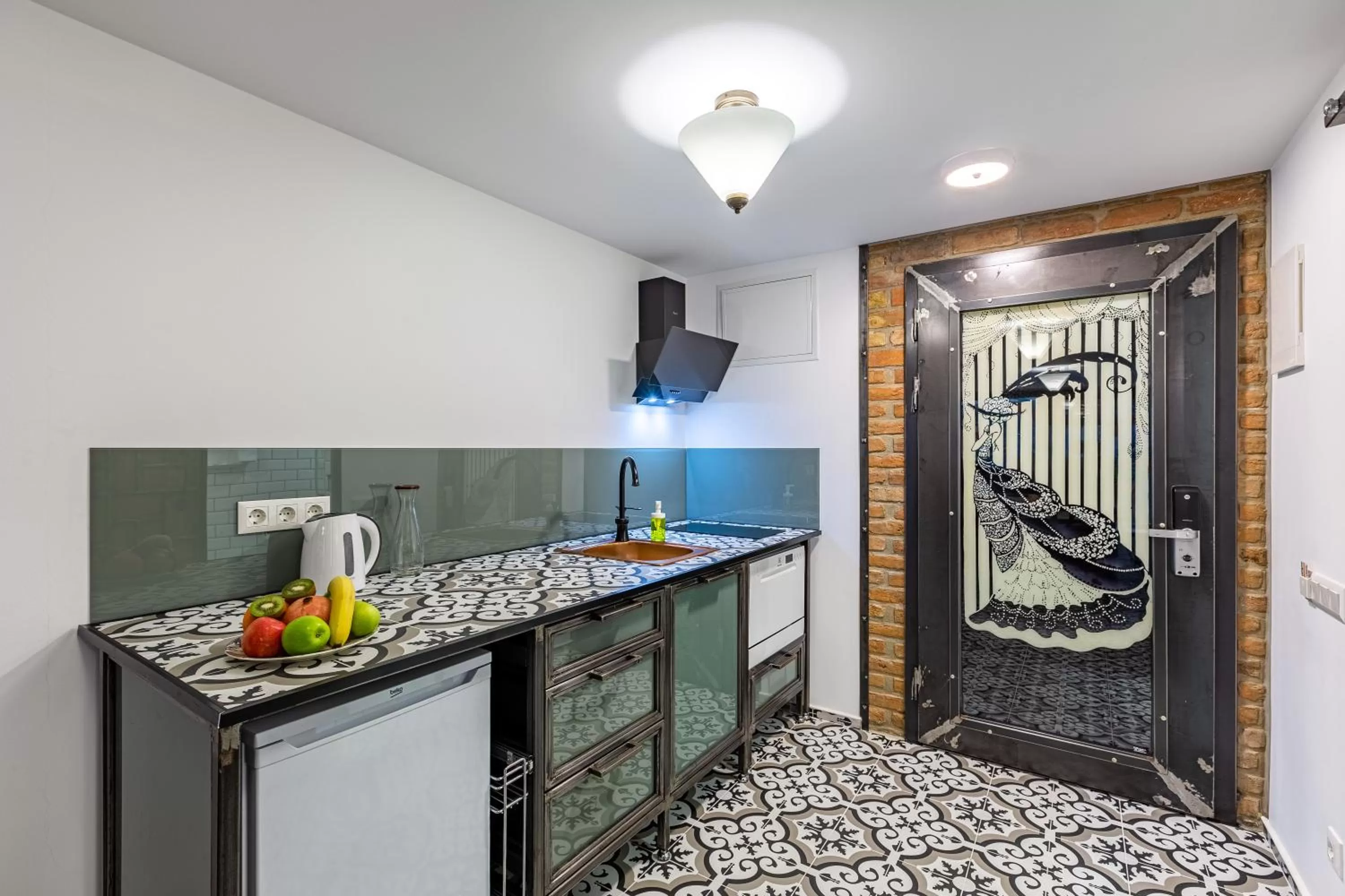 Kitchen or kitchenette in Villa Pera Suite Hotel