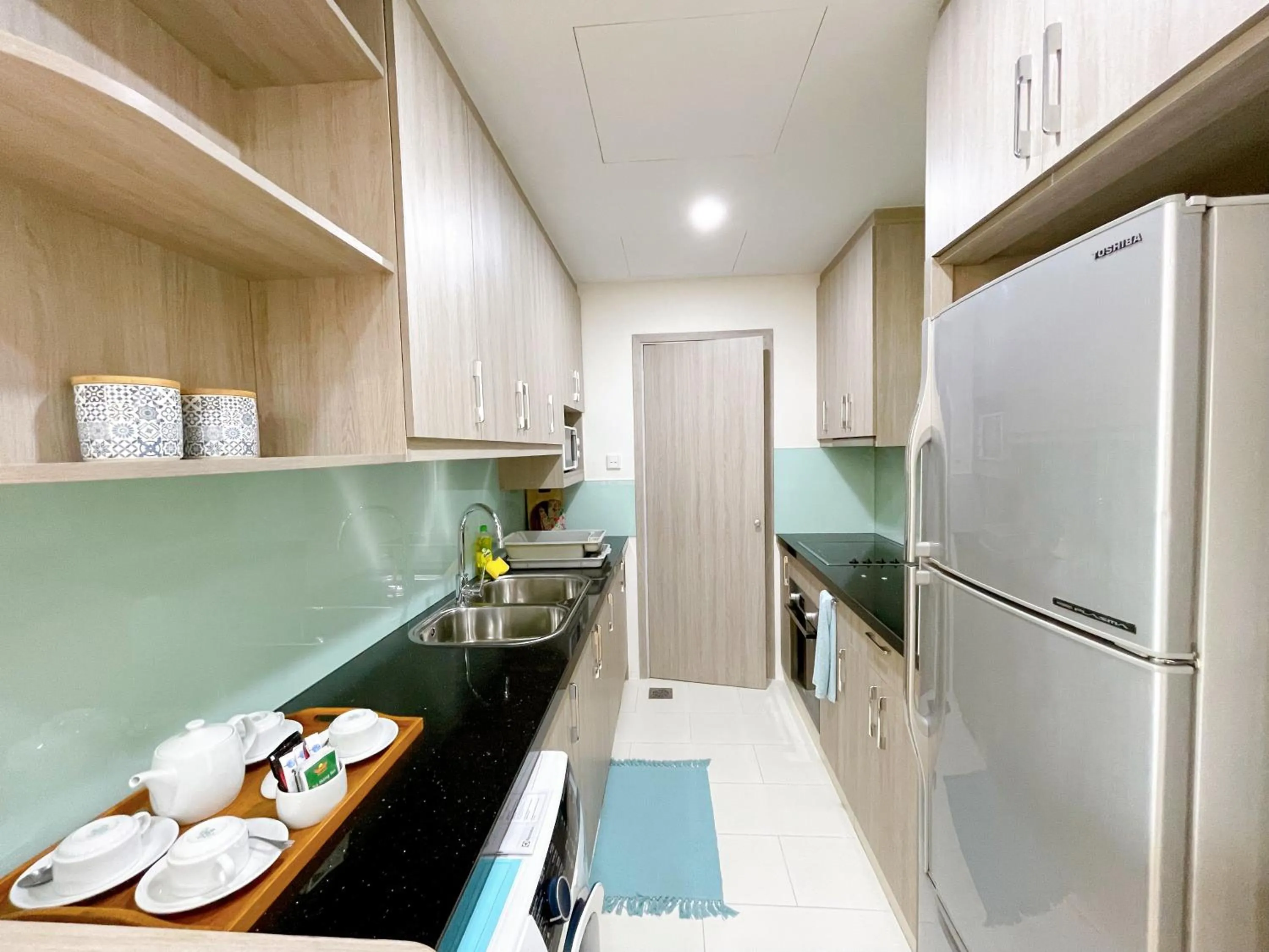 Kitchen or kitchenette in Diamond Westlake Suites