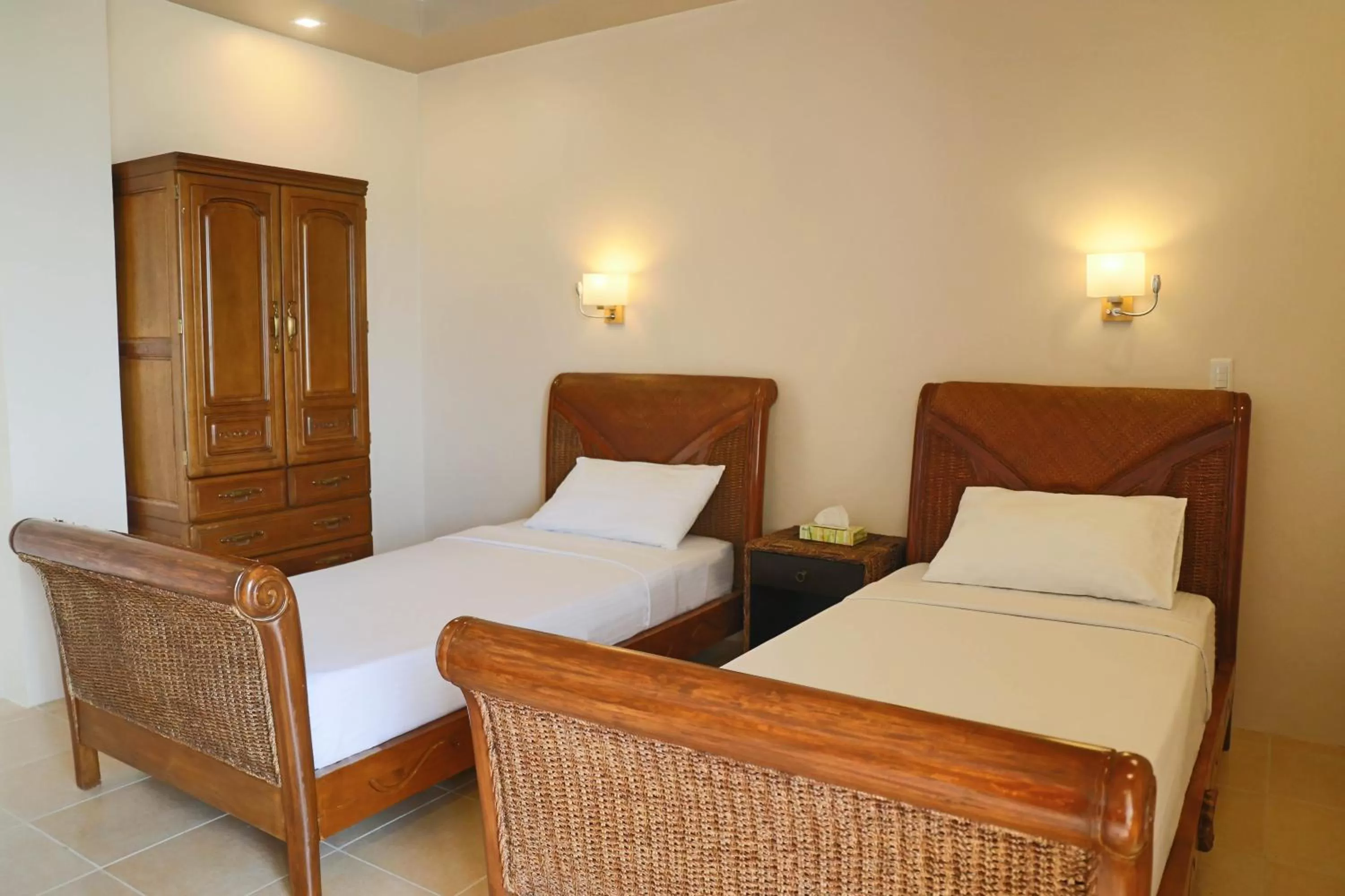 Bed in Turtle Bay Dive Resort