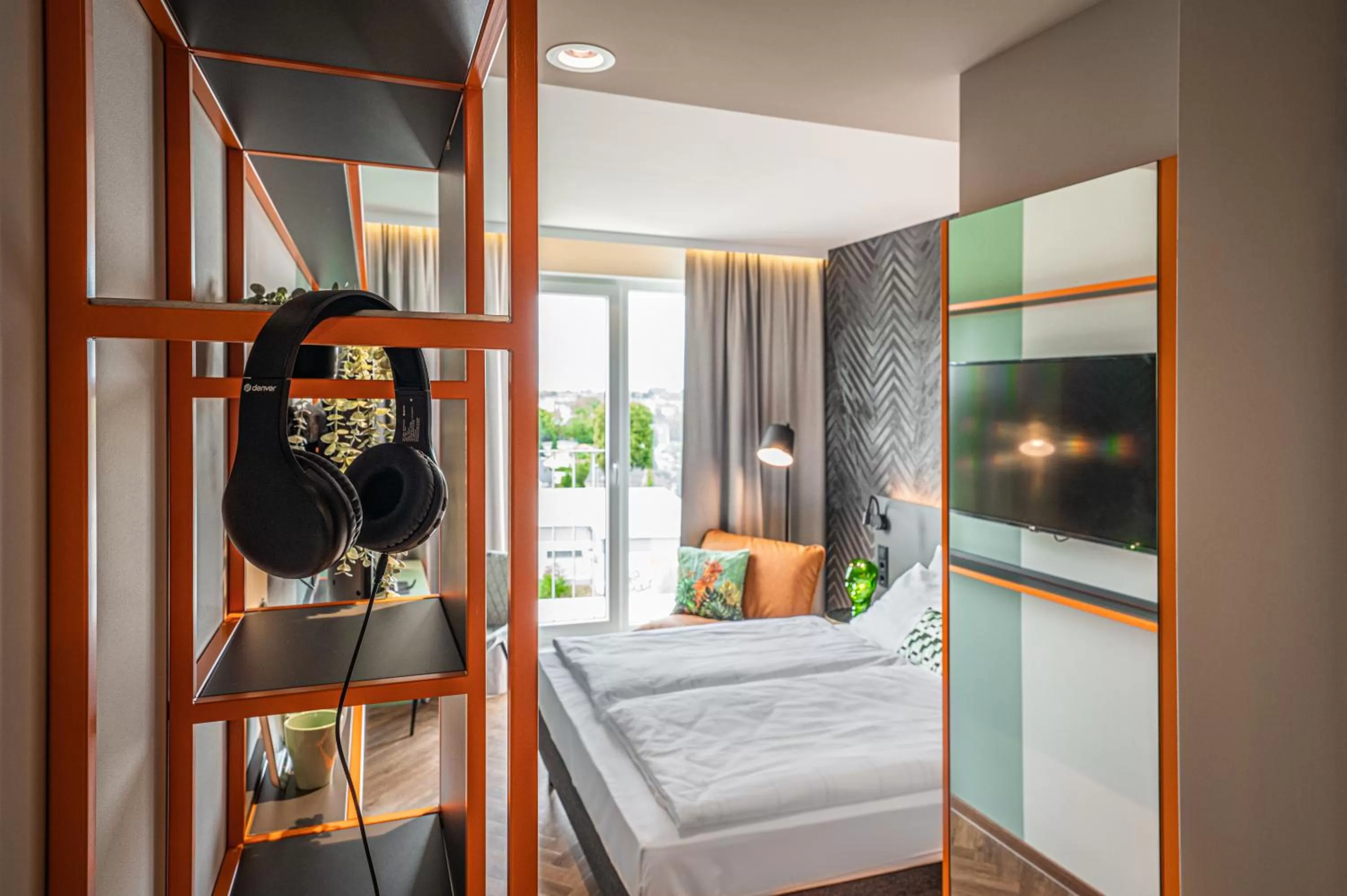 Bed in LOGINN Hotel Berlin Airport