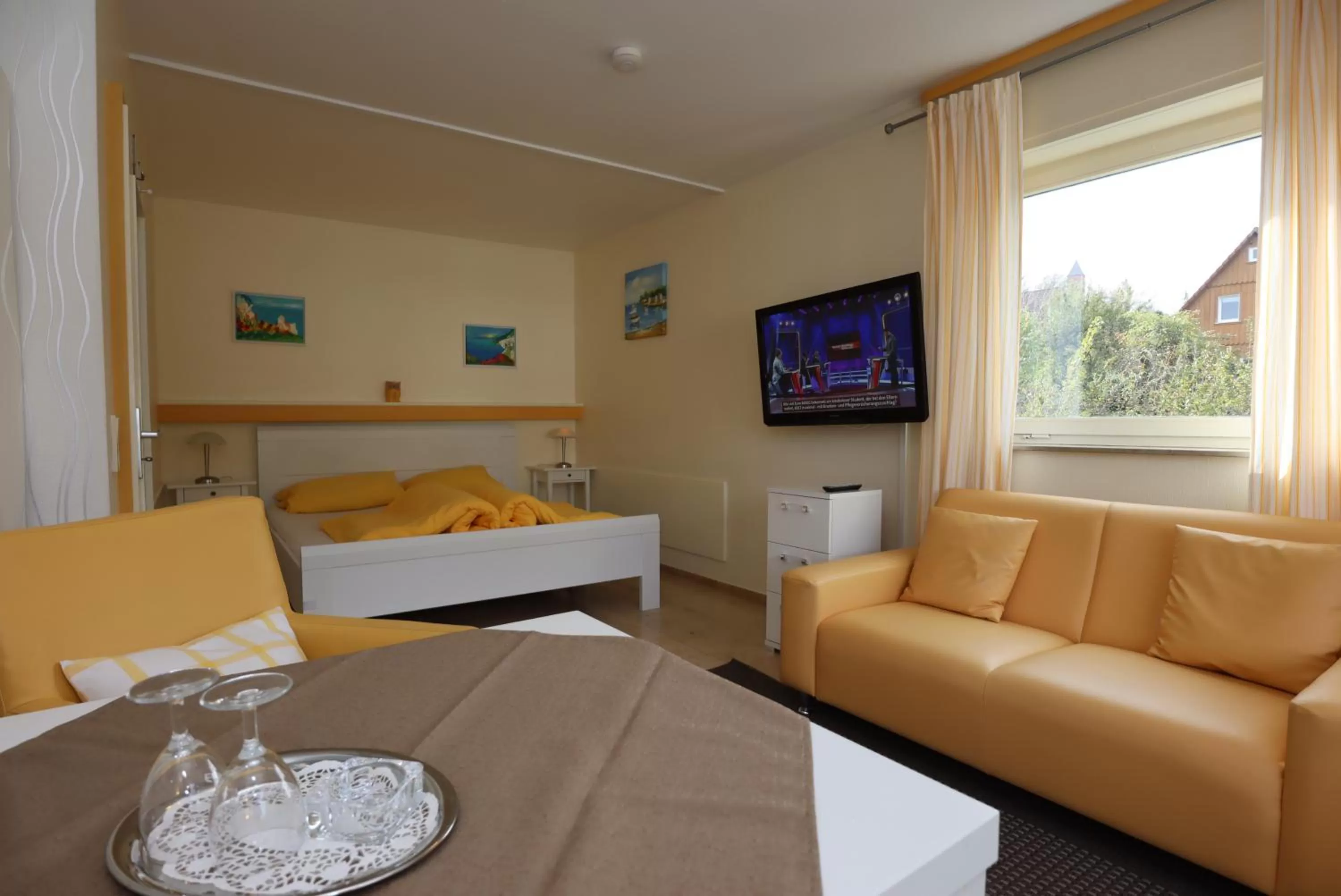 Bed, Seating Area in Hotel Sonnenhof Garni