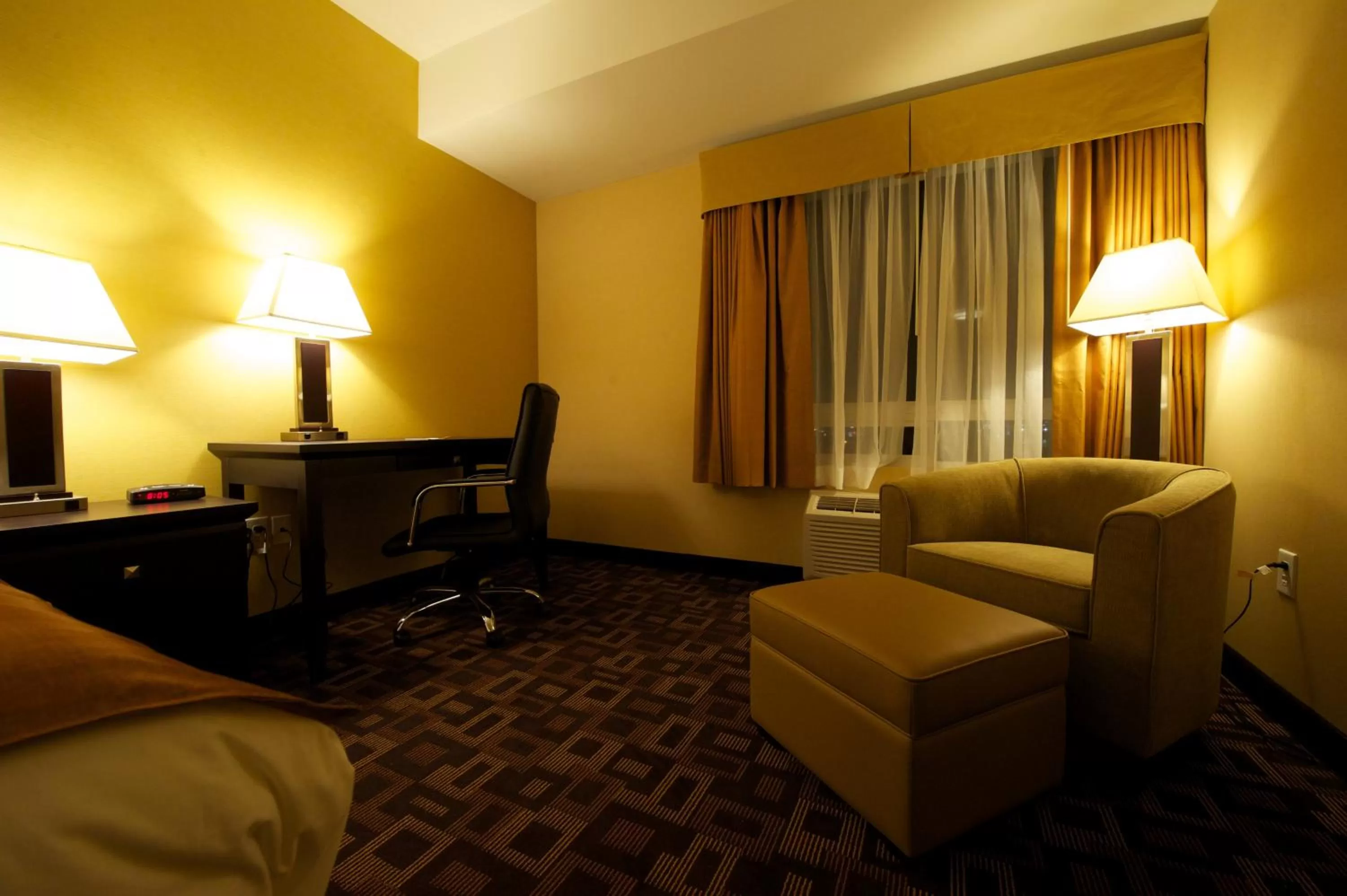 Queen Room with Two Queen Beds - Non-Smoking in Days Inn & Suites by Wyndham Winnipeg Airport Manitoba