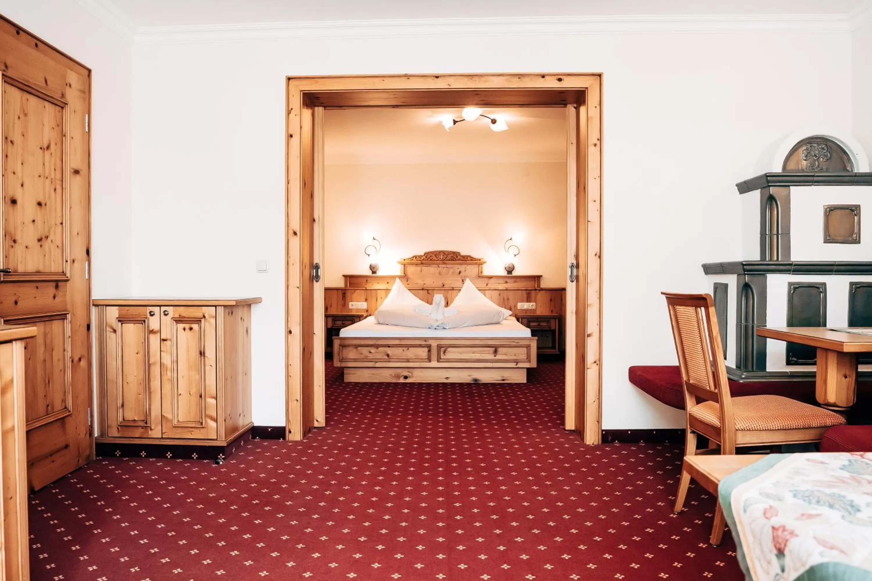 Bed in POST POST Hotel - Alpine Boutique Hotel & Spa