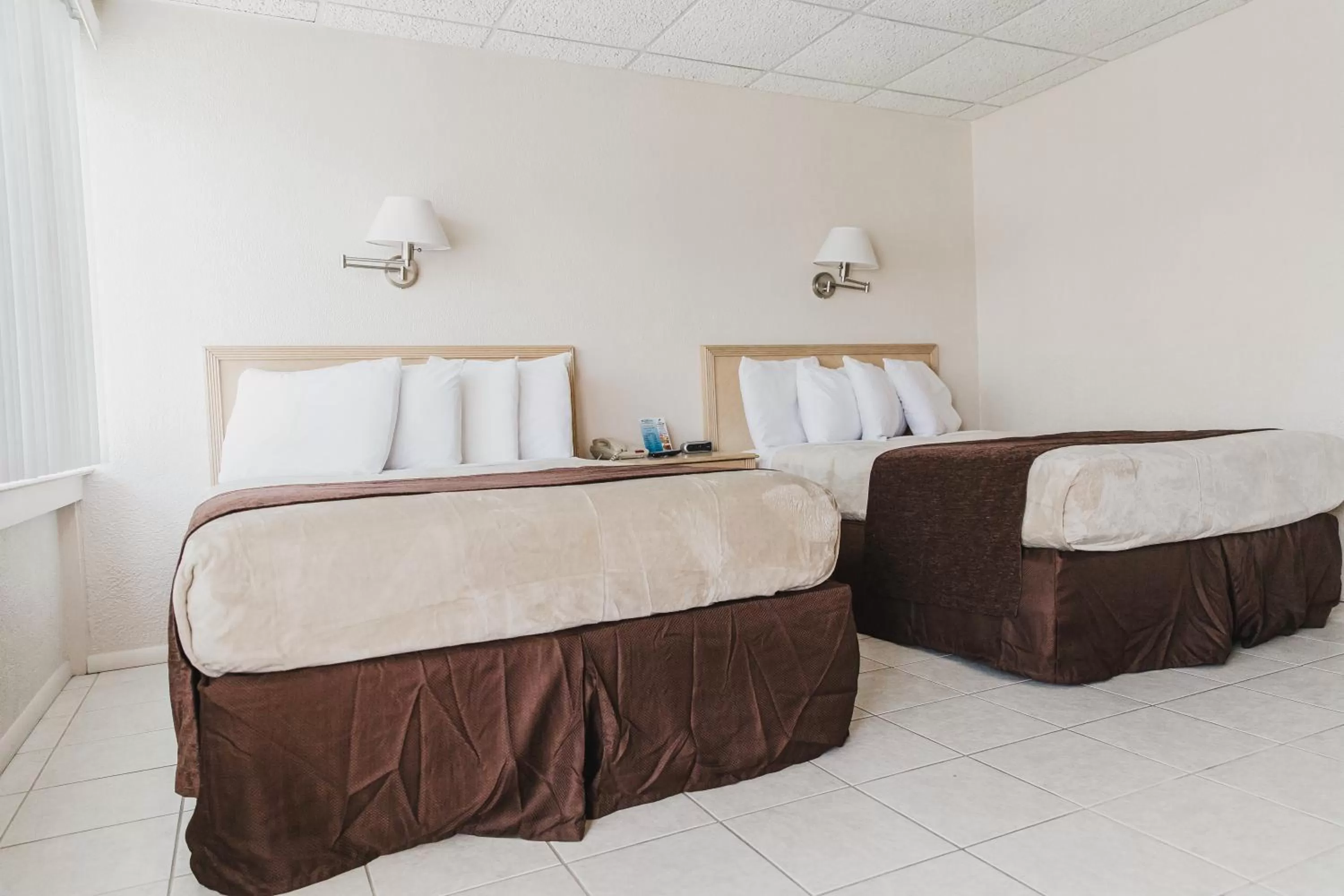 Bed in Heart of Wildwood Boardwalk Motel