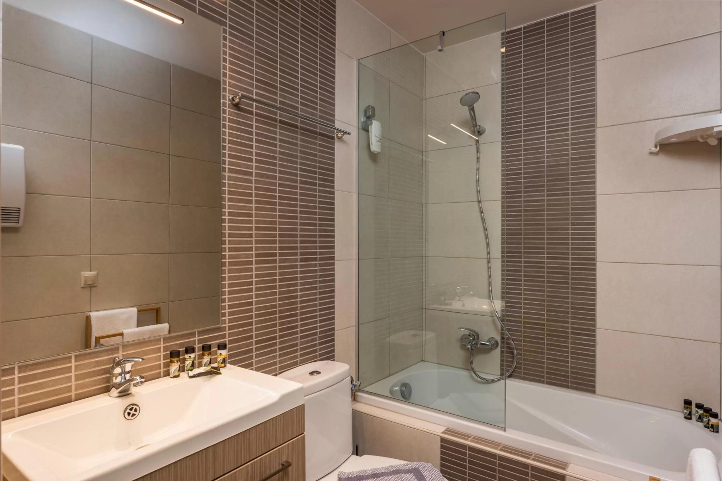 Bathroom in Trianon Luxury Apartments & Suites