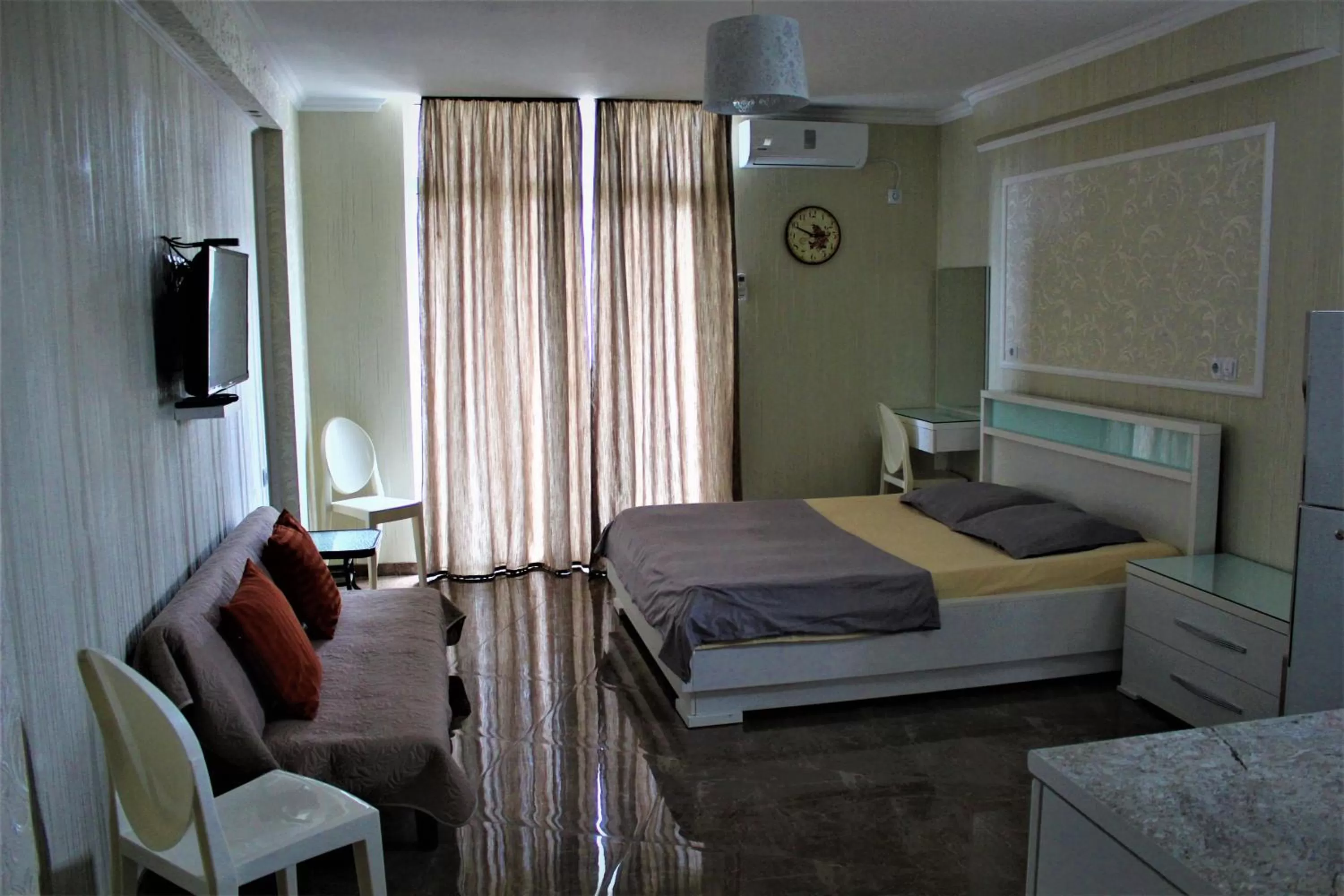 Bed in Orbi Lux Apartment