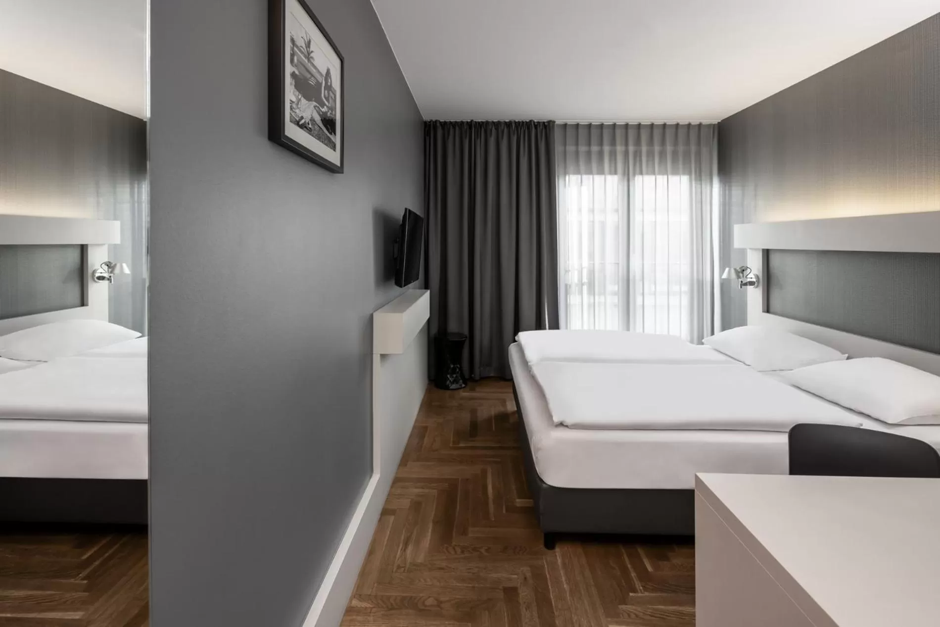 Bed in Hotel AMANO Rooms & Apartments