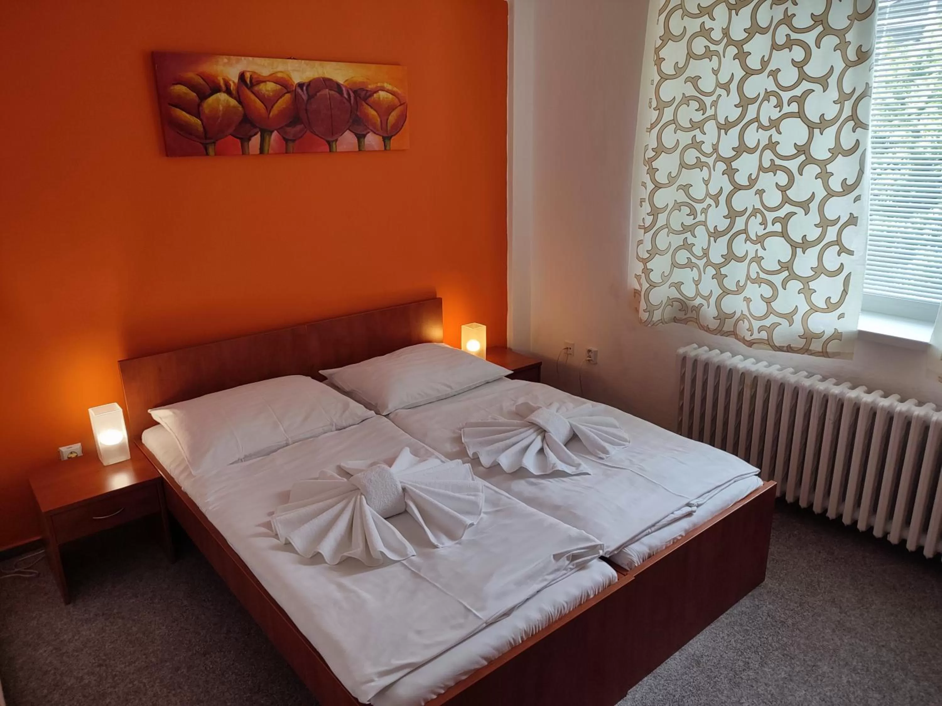 Bed in BEST Hotel Garni