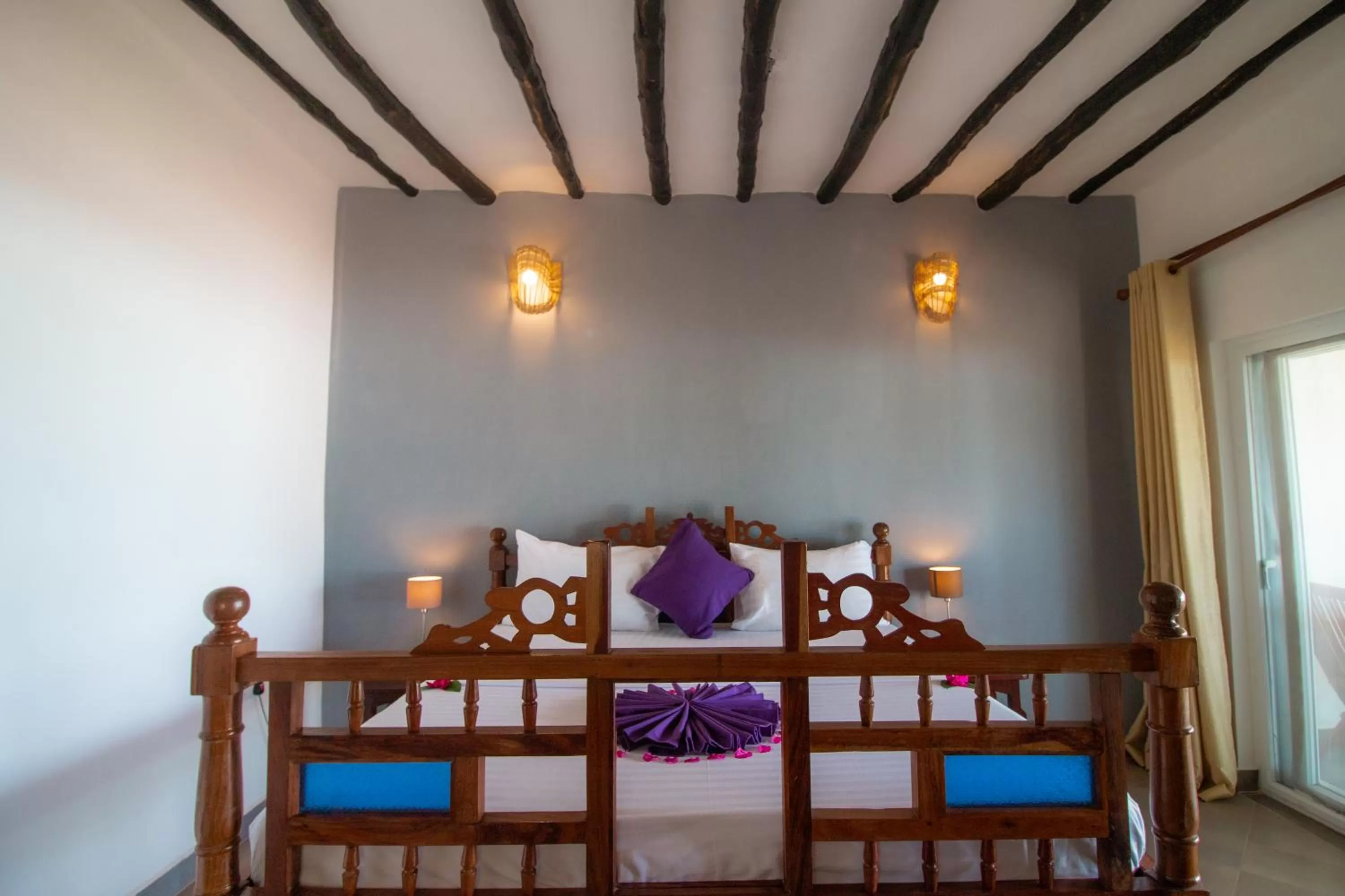 Bed in Tanzanite Beach Resort