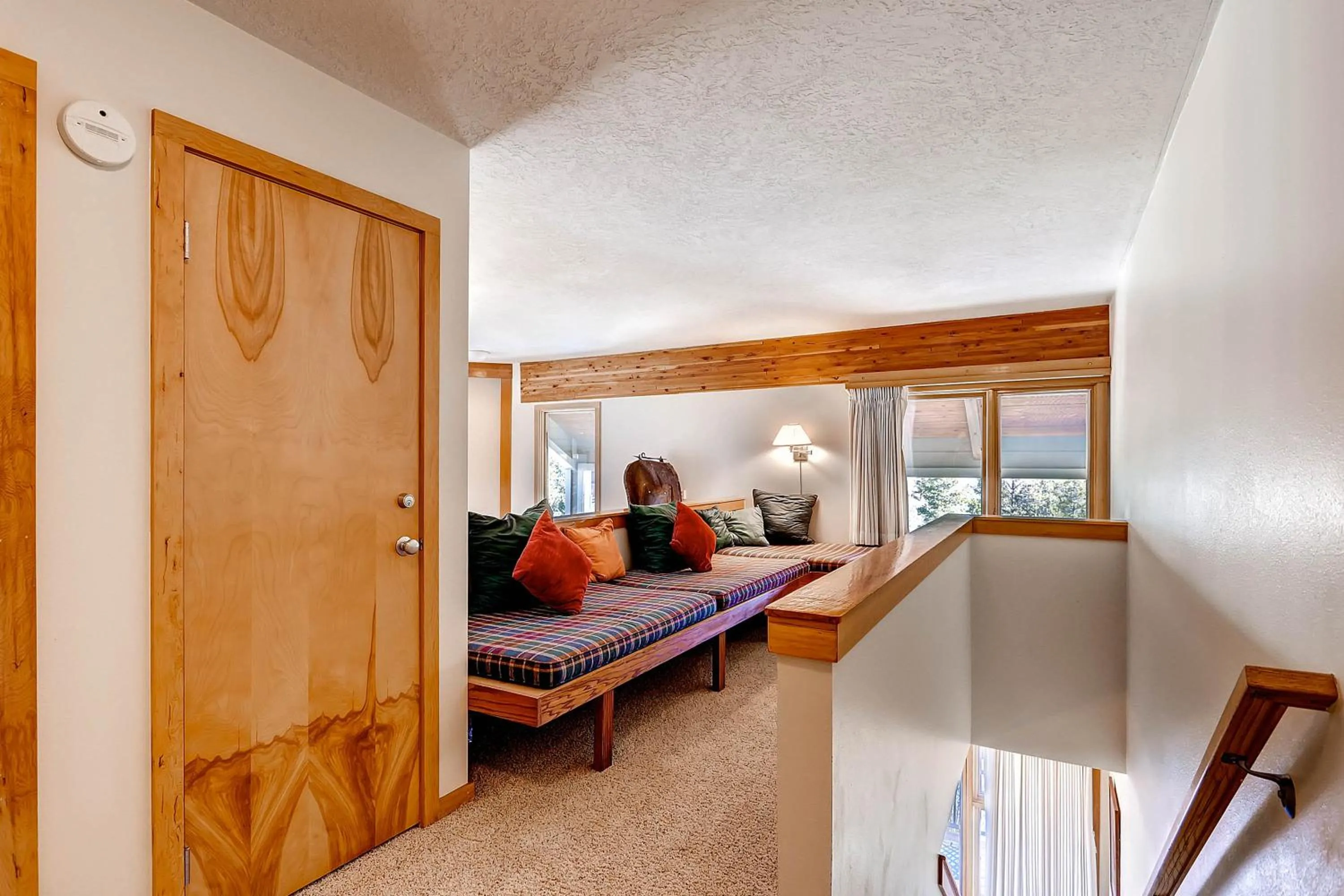 Living room, Bed in Evergreen Condominiums by Keystone Resort