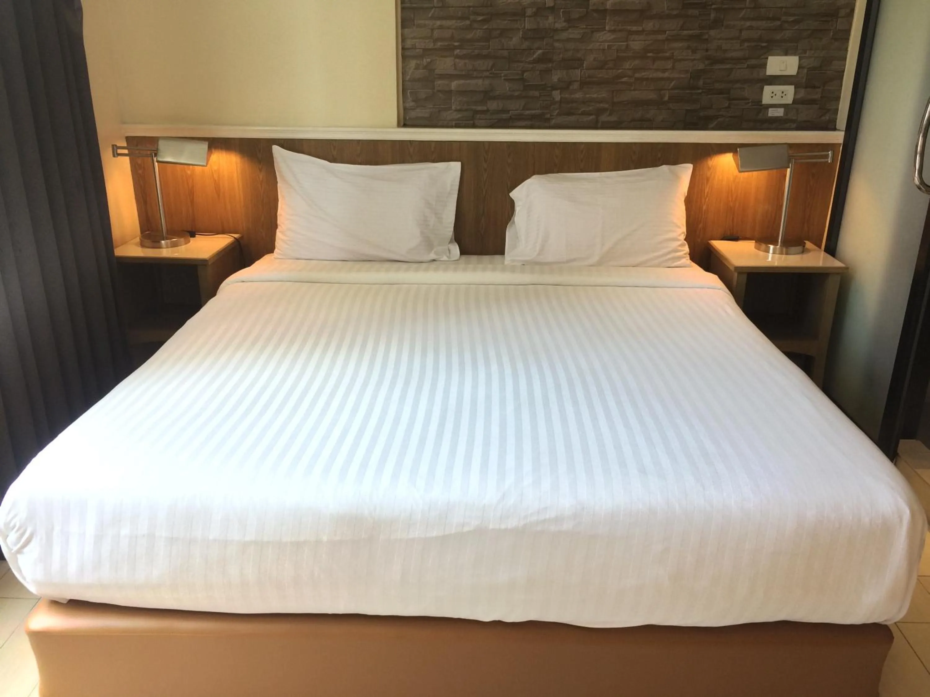 Bed in Bourbon St. Boutique Hotel