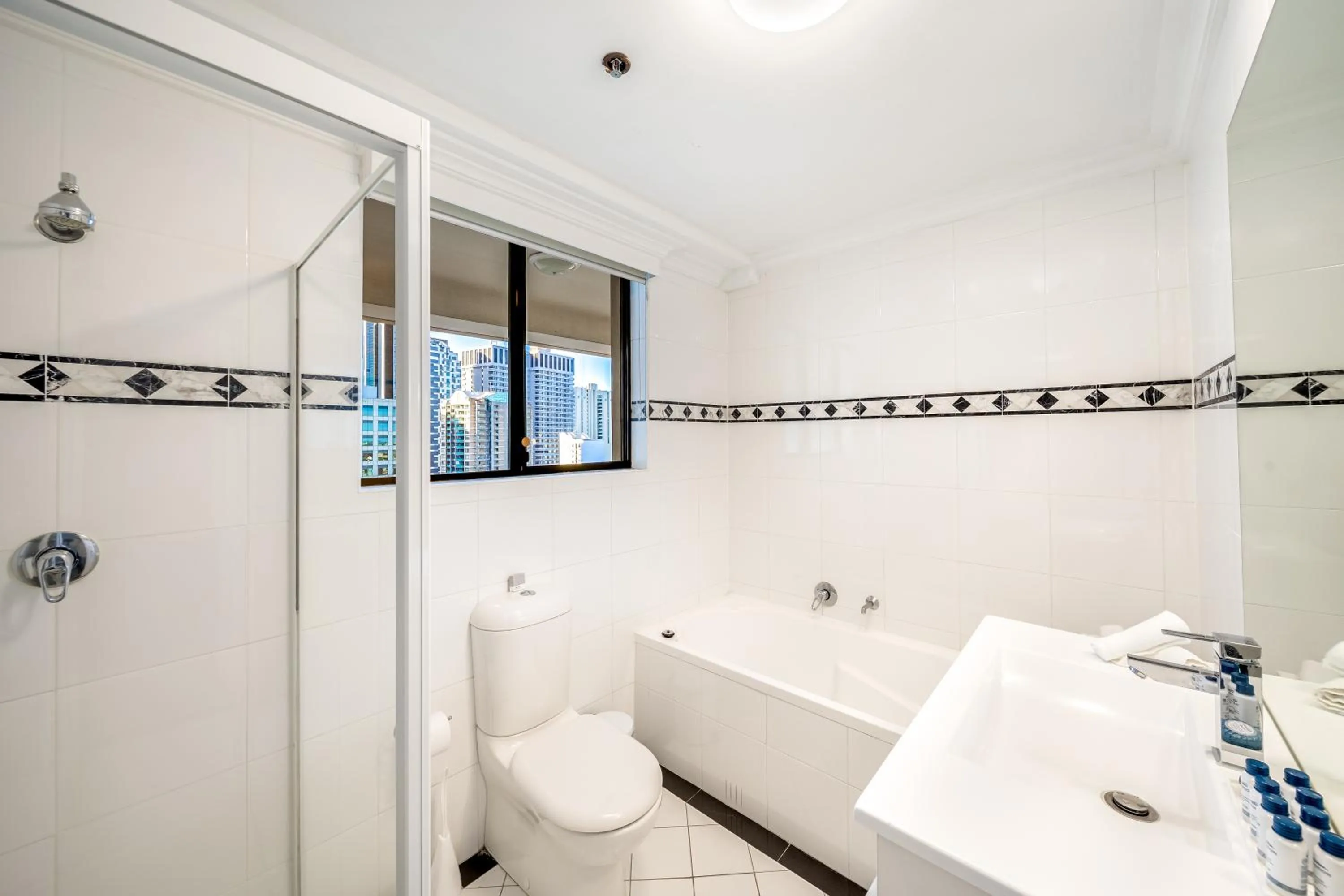 Shower in Oaks Sydney Castlereagh Suites