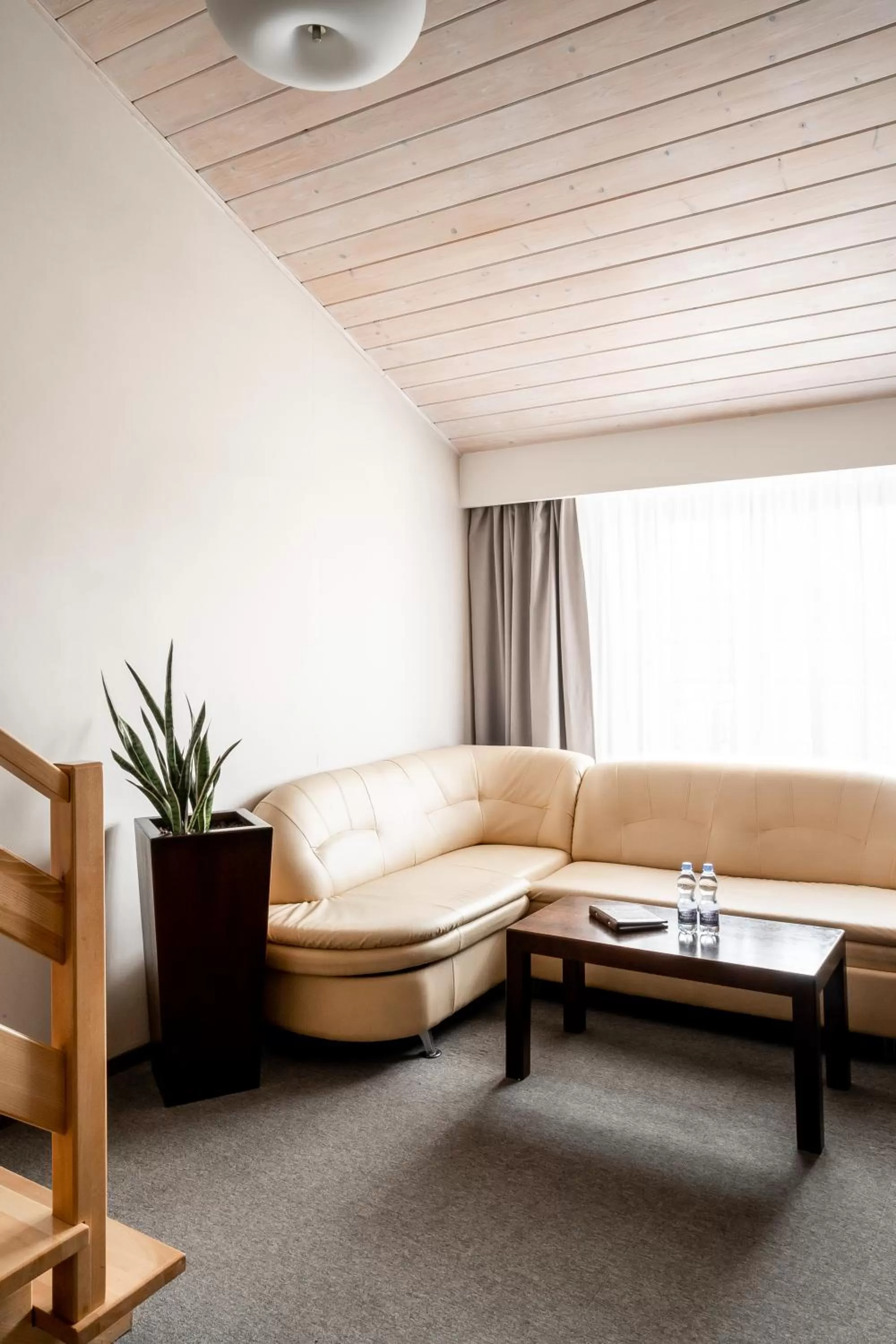 Seating area in Rezydencja Sienkiewiczówka