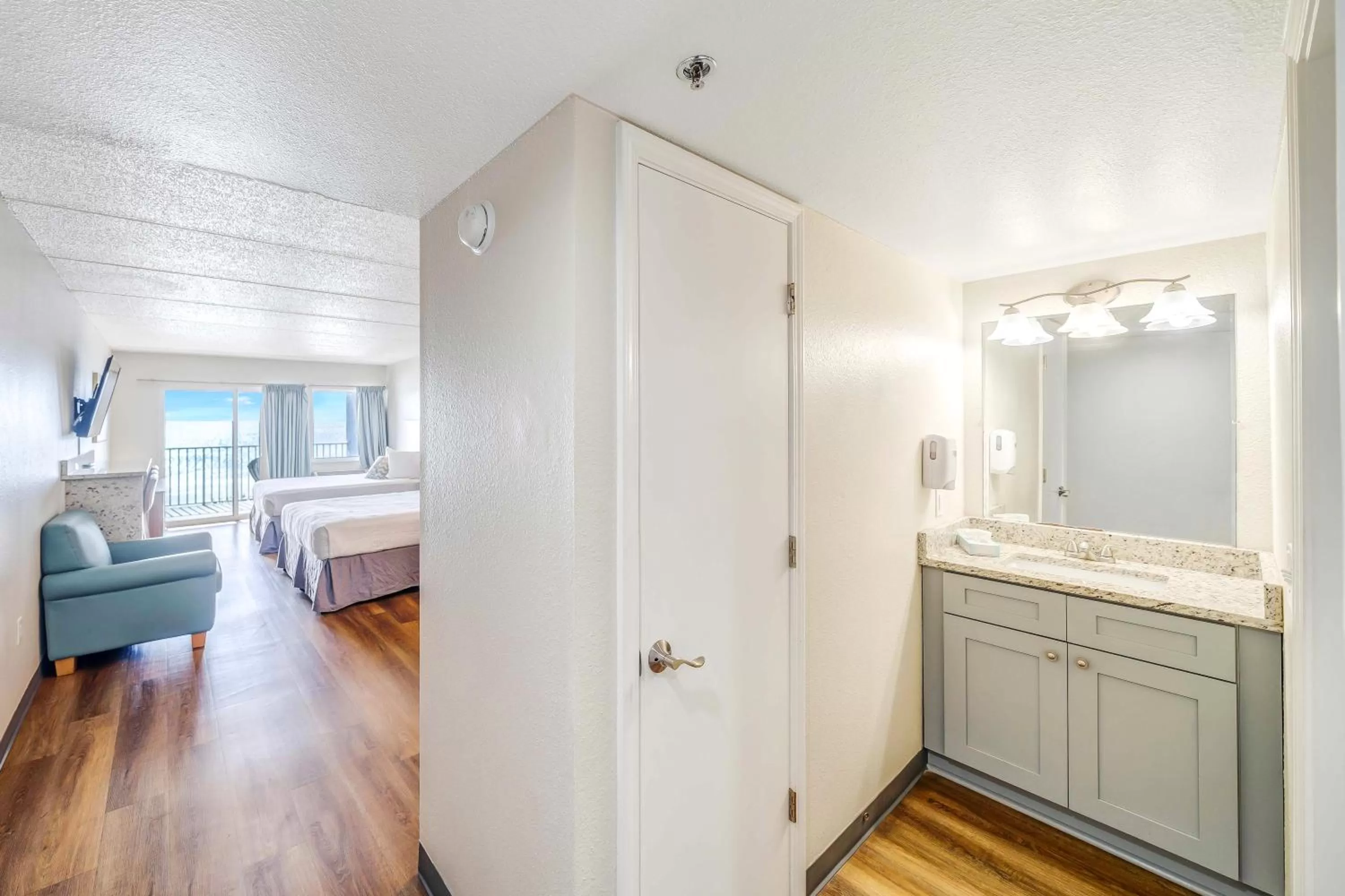 Bathroom, Bed in Sugar Sands Beachfront Hotel, a By The Sea Resort