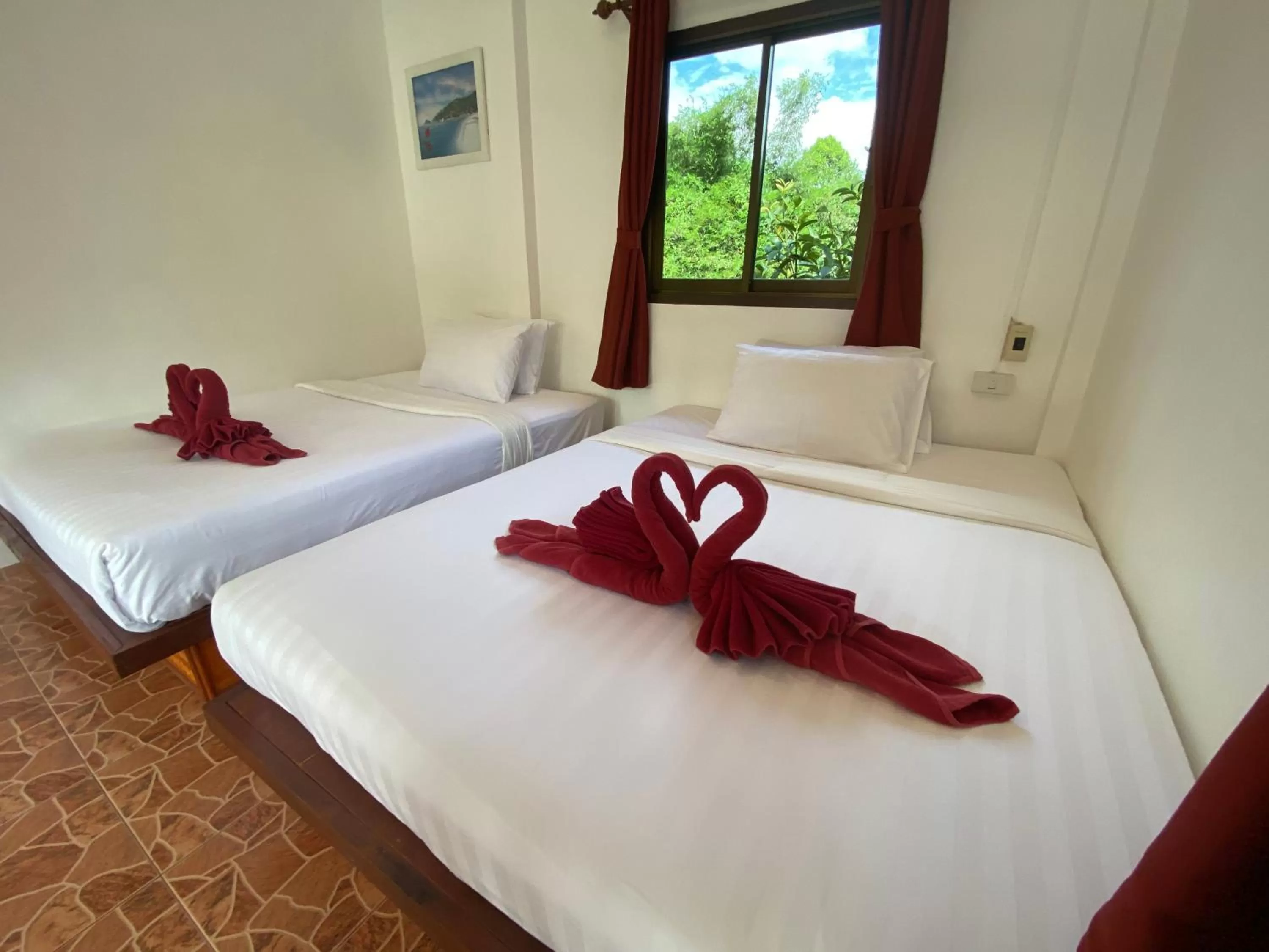 Bed in Khao Sok Jungle Huts Resort