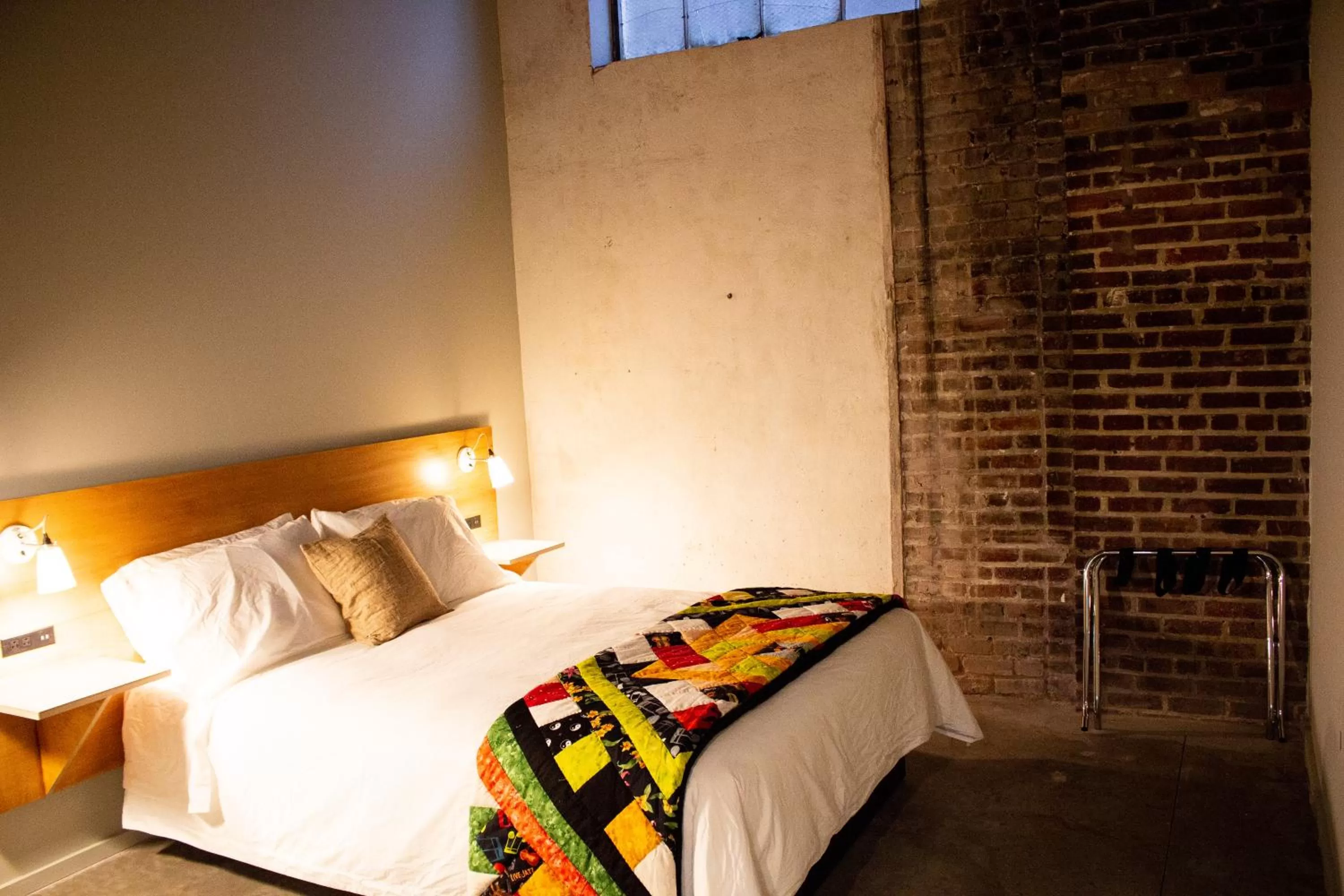 Bed in Travelers Hotel