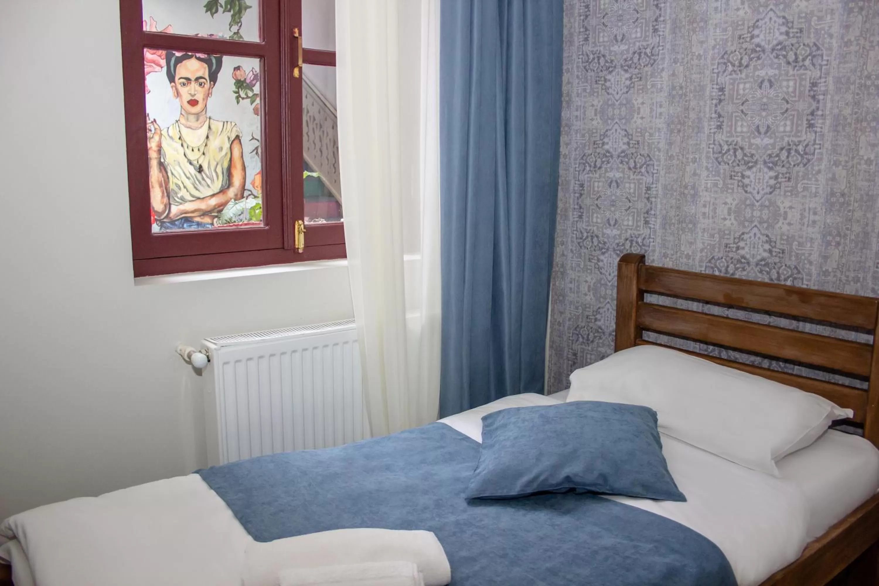 Bedroom in Check Point Hotel