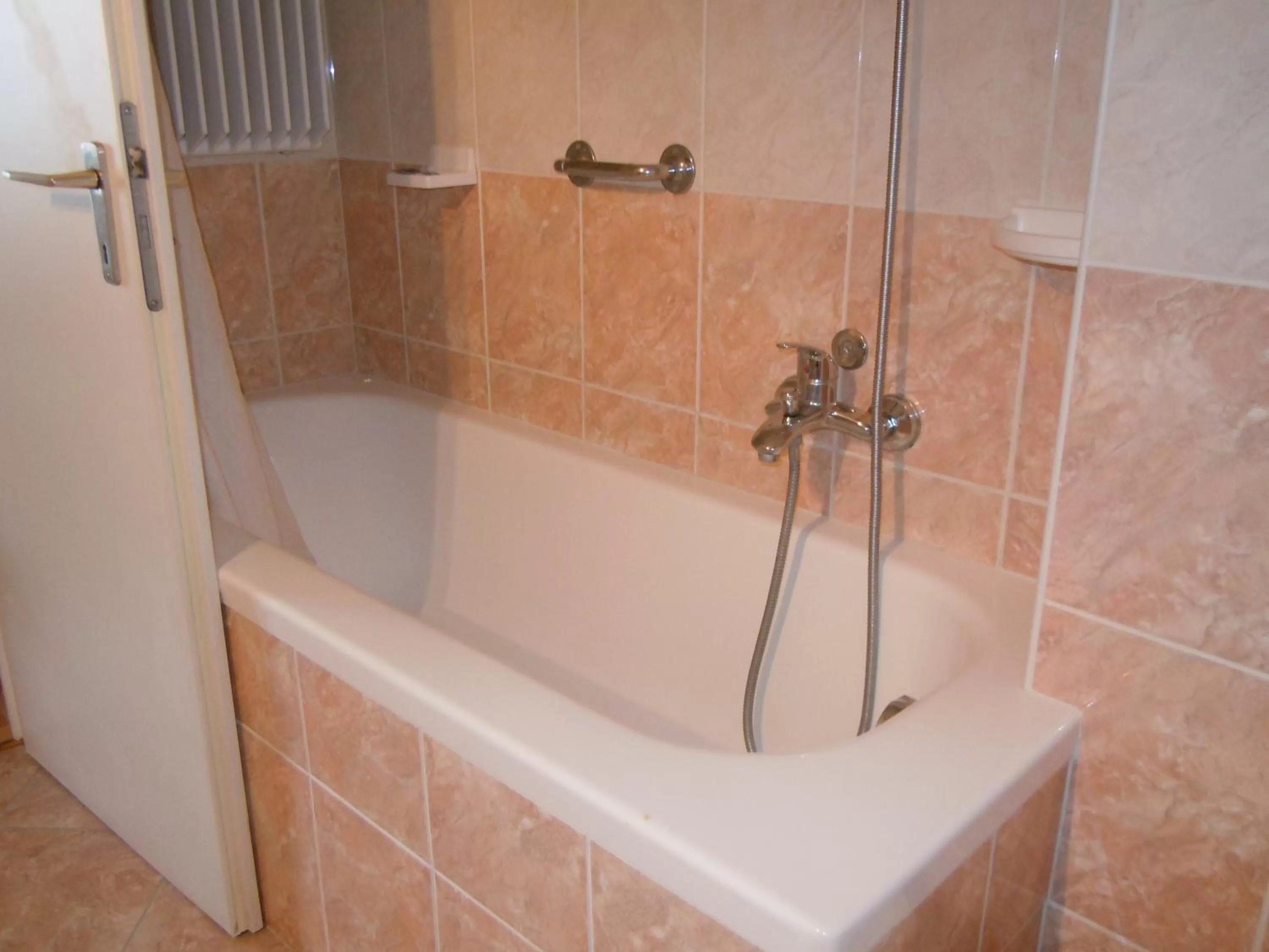 Bathroom in Swiss Lodge Nassa Garni