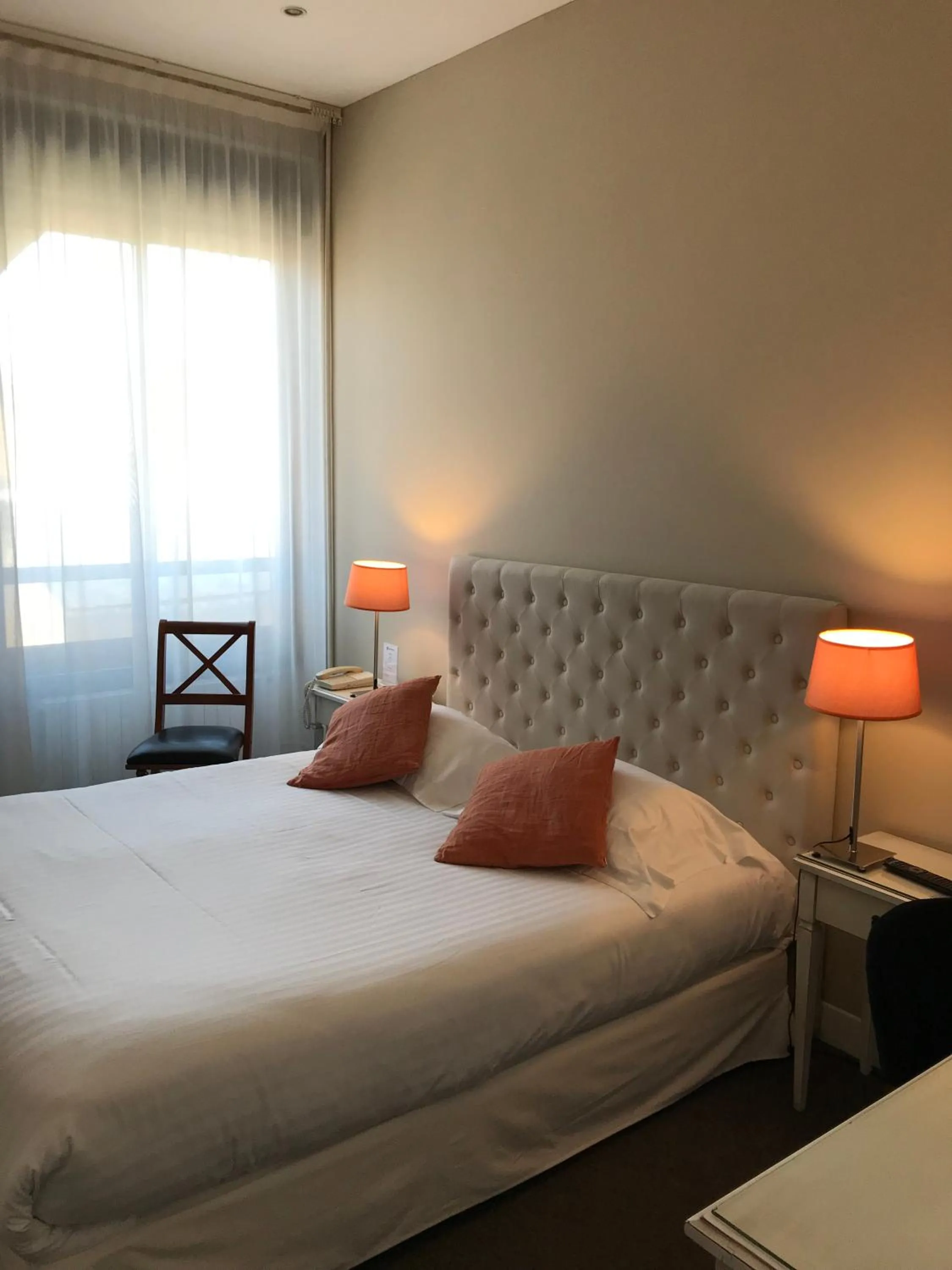 Bed in Hotel Le Renoir