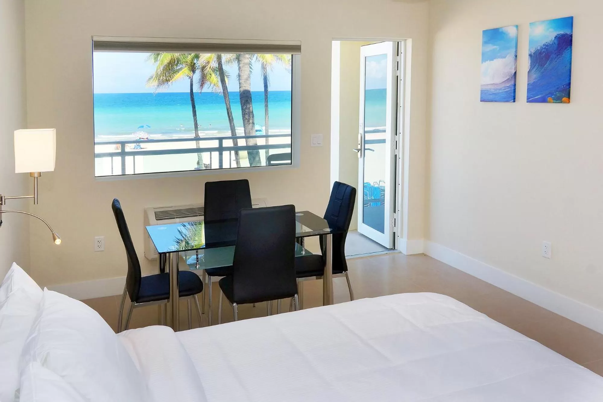 Dining area, Bed in Diane Oceanfront Suites