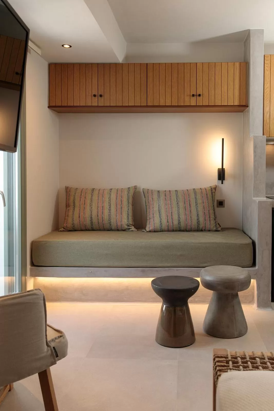 Bed, Seating Area in Makava Suites Naxos