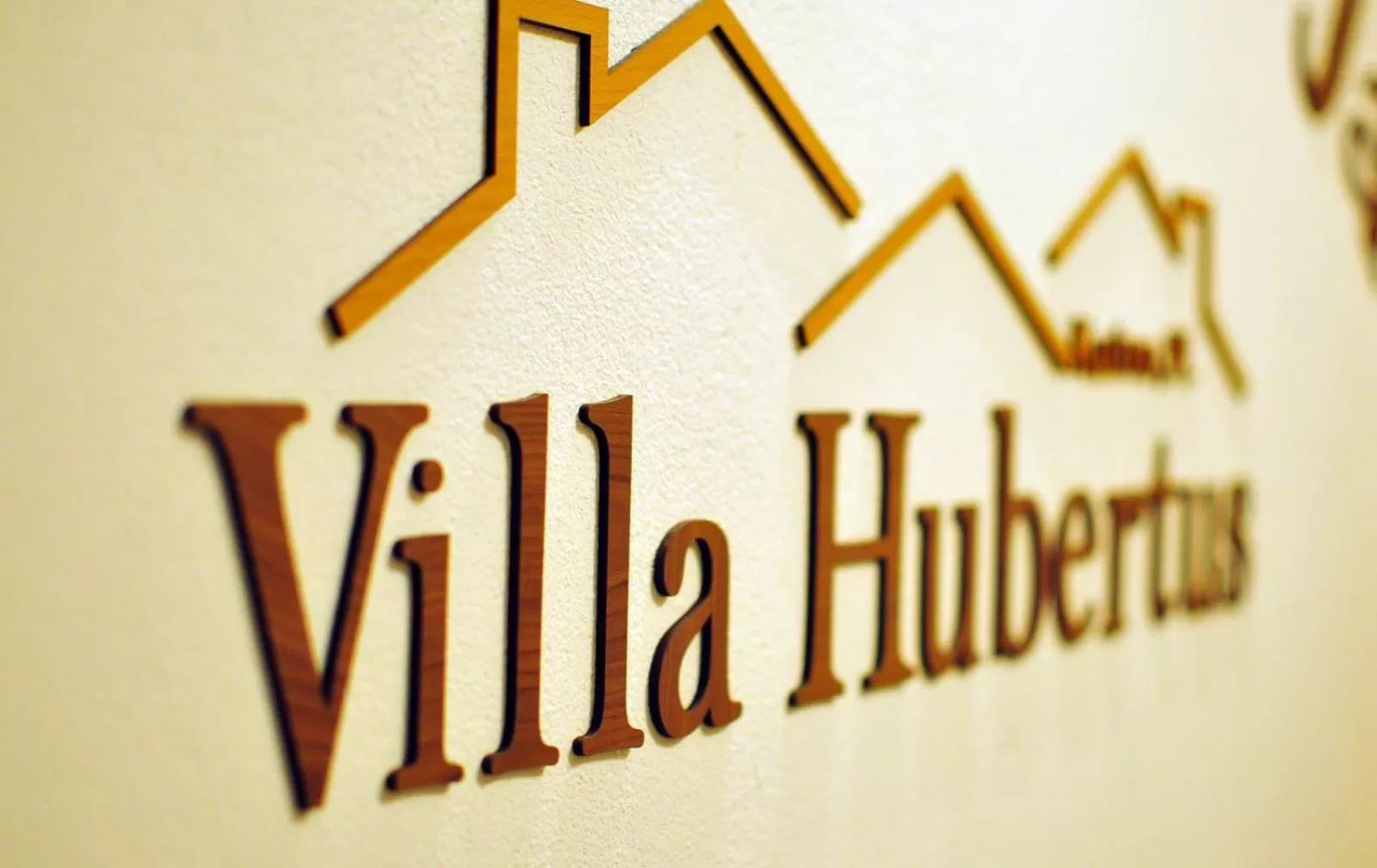 Property logo or sign in Hotel Villa Hubertus Kutno