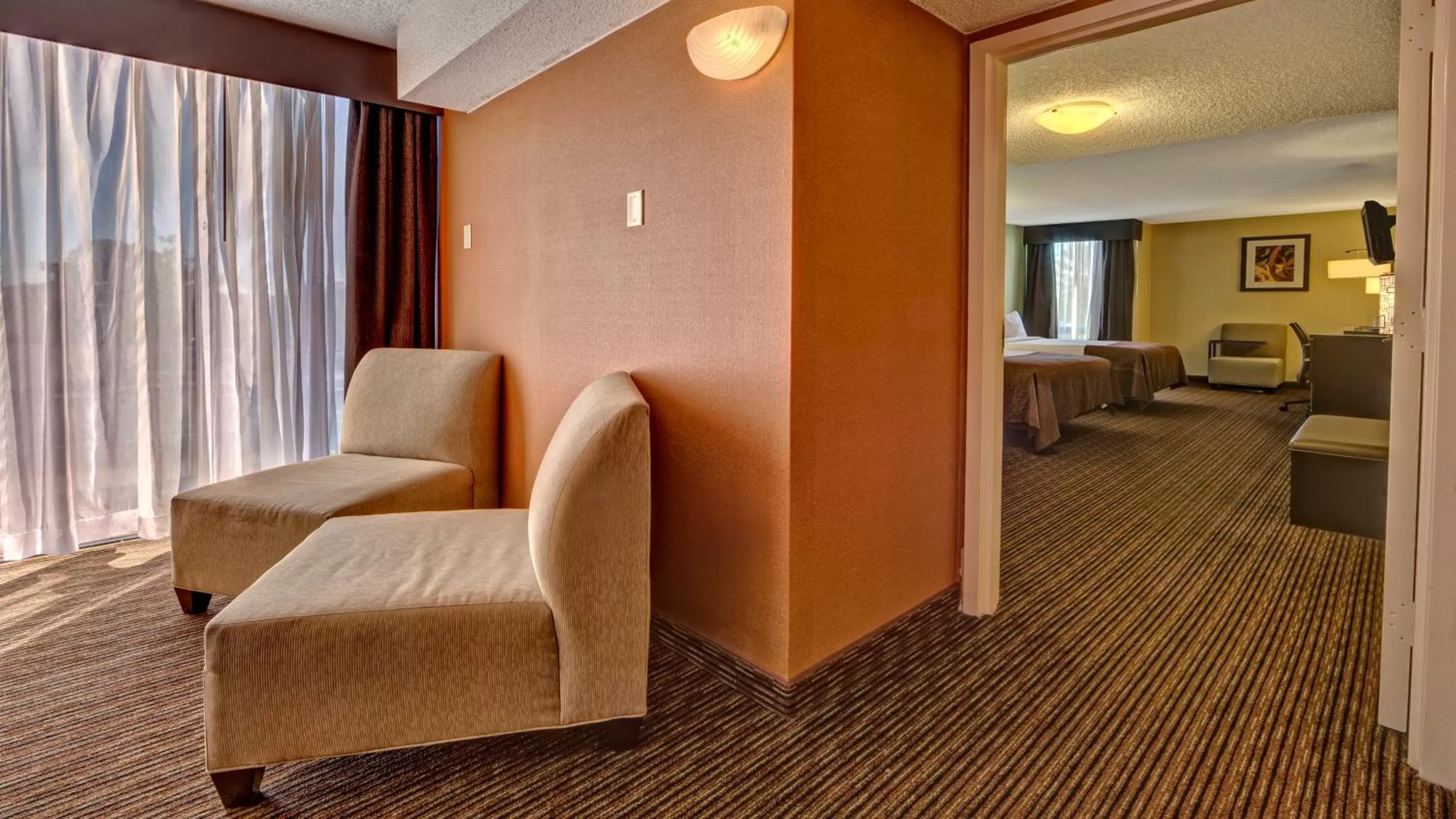 Photo of the whole room, Seating Area in Clarion Hotel & Suites Conference Center Memphis Airport