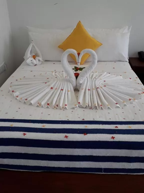 Bed in J7 Villaj Resort