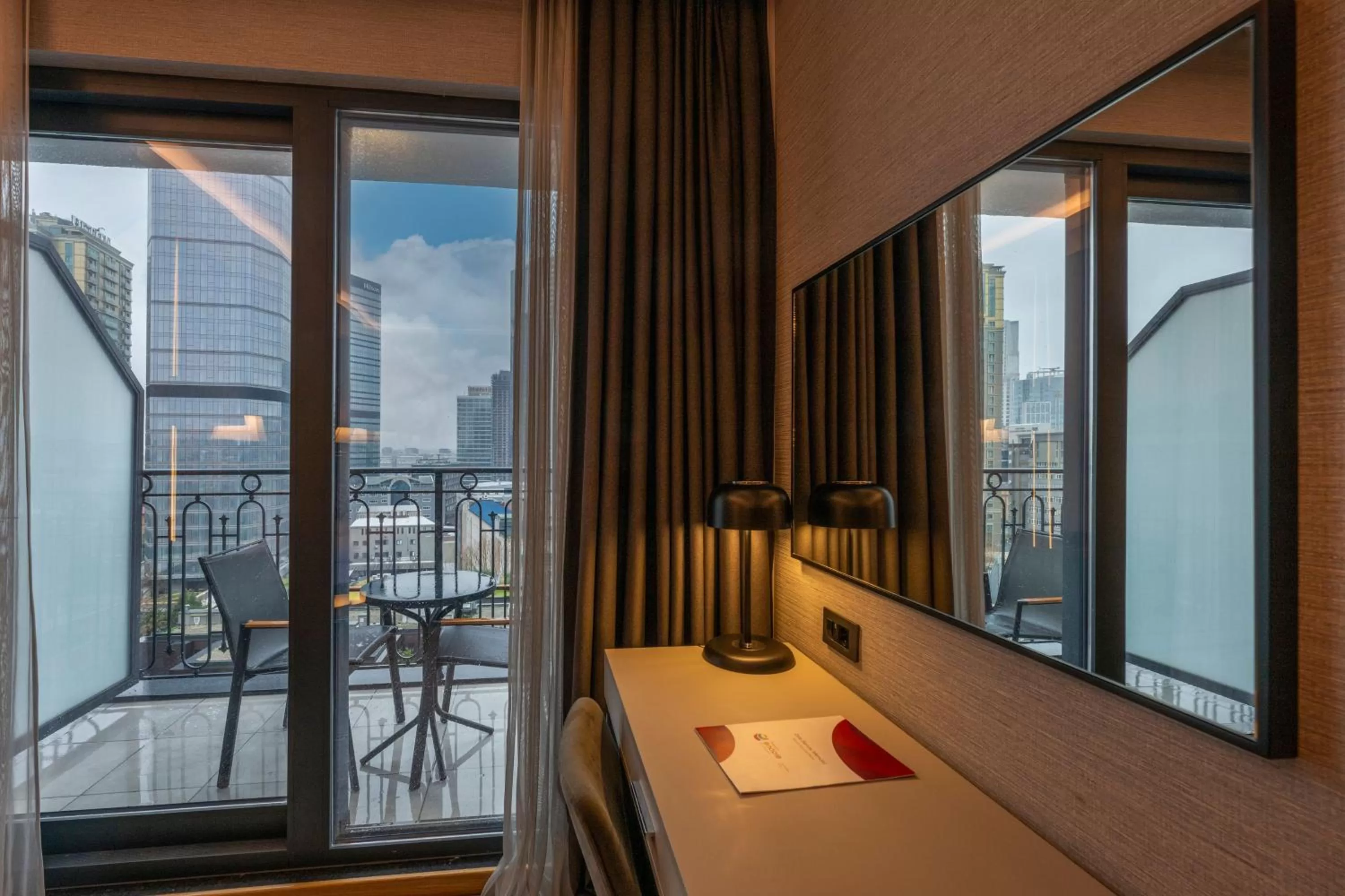 Balcony/Terrace, Bed in Ramada Encore by Wyndham Istanbul Sisli