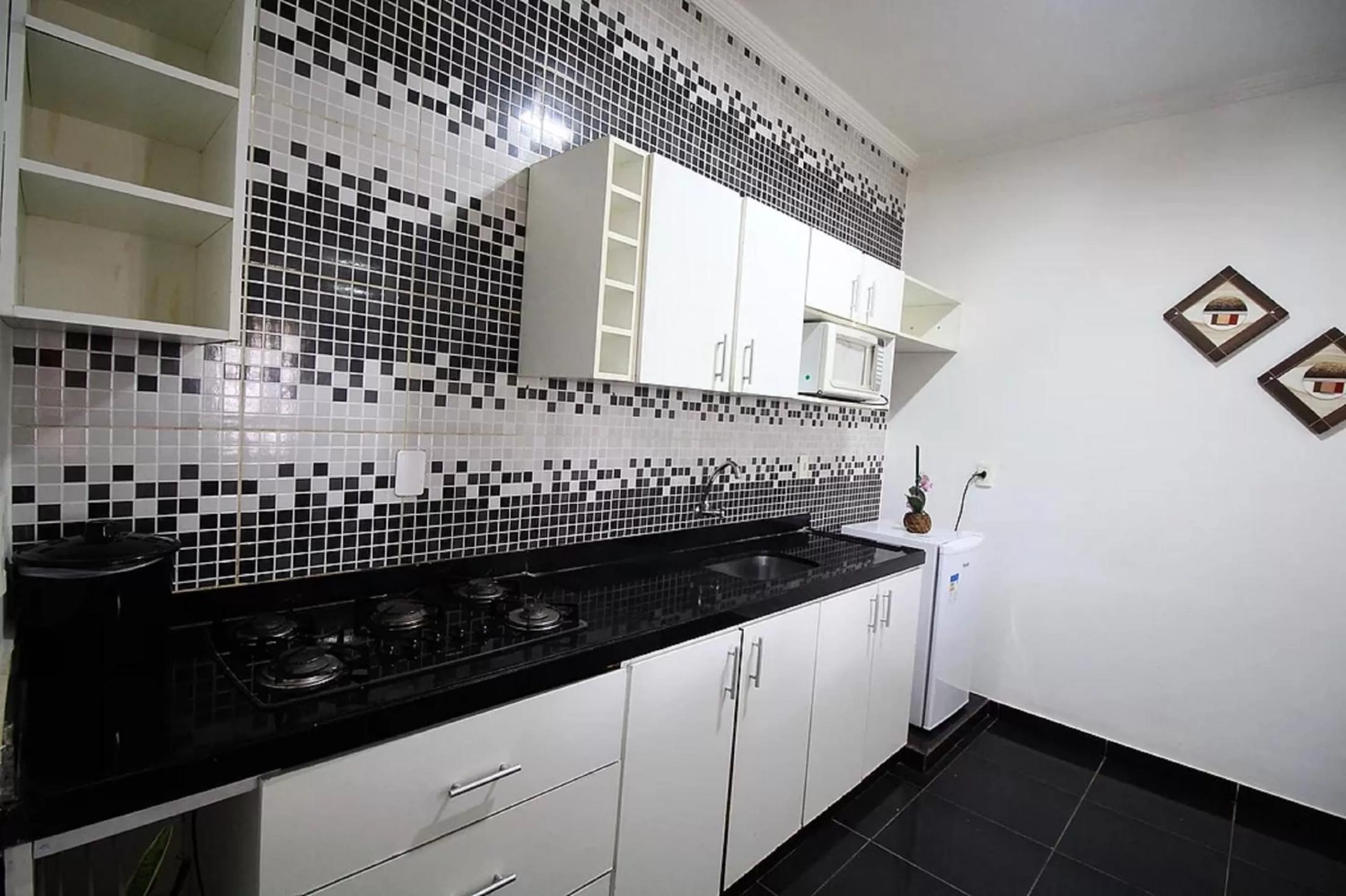 Kitchen or kitchenette in Pousada Ello