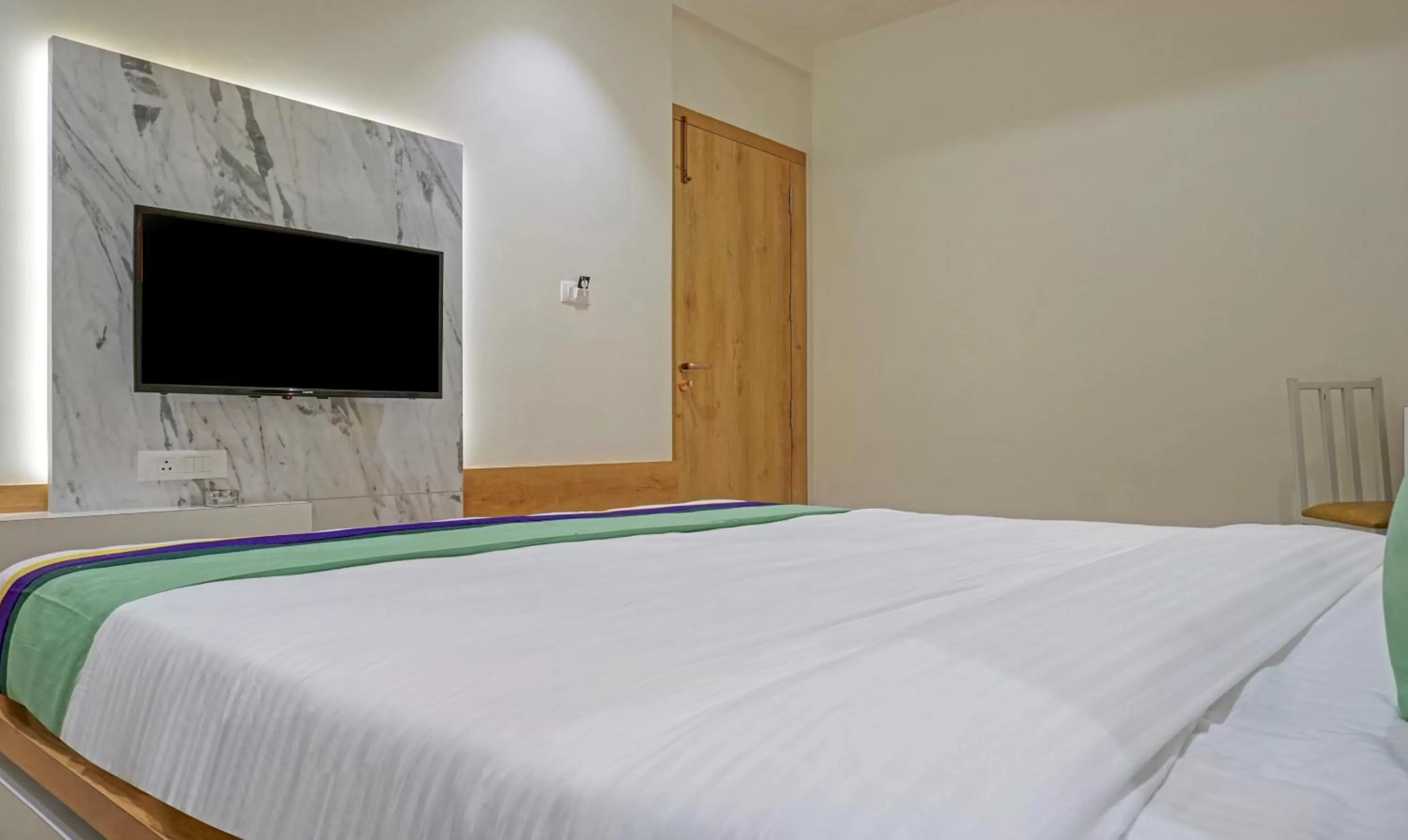 Bedroom, Bed in Treebo The Utsav, Nashik