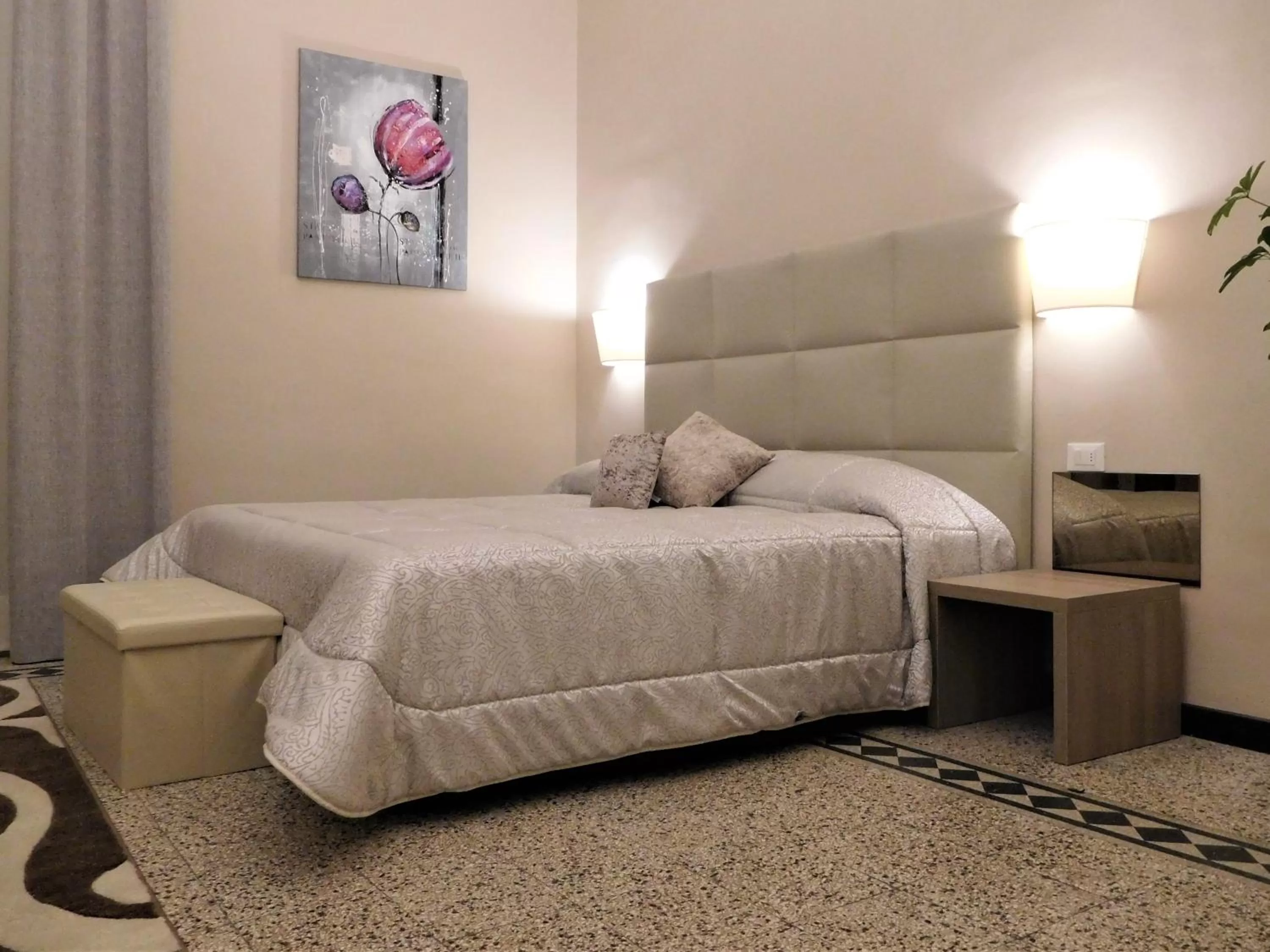 Bed in Moonlight Hotel&Suites