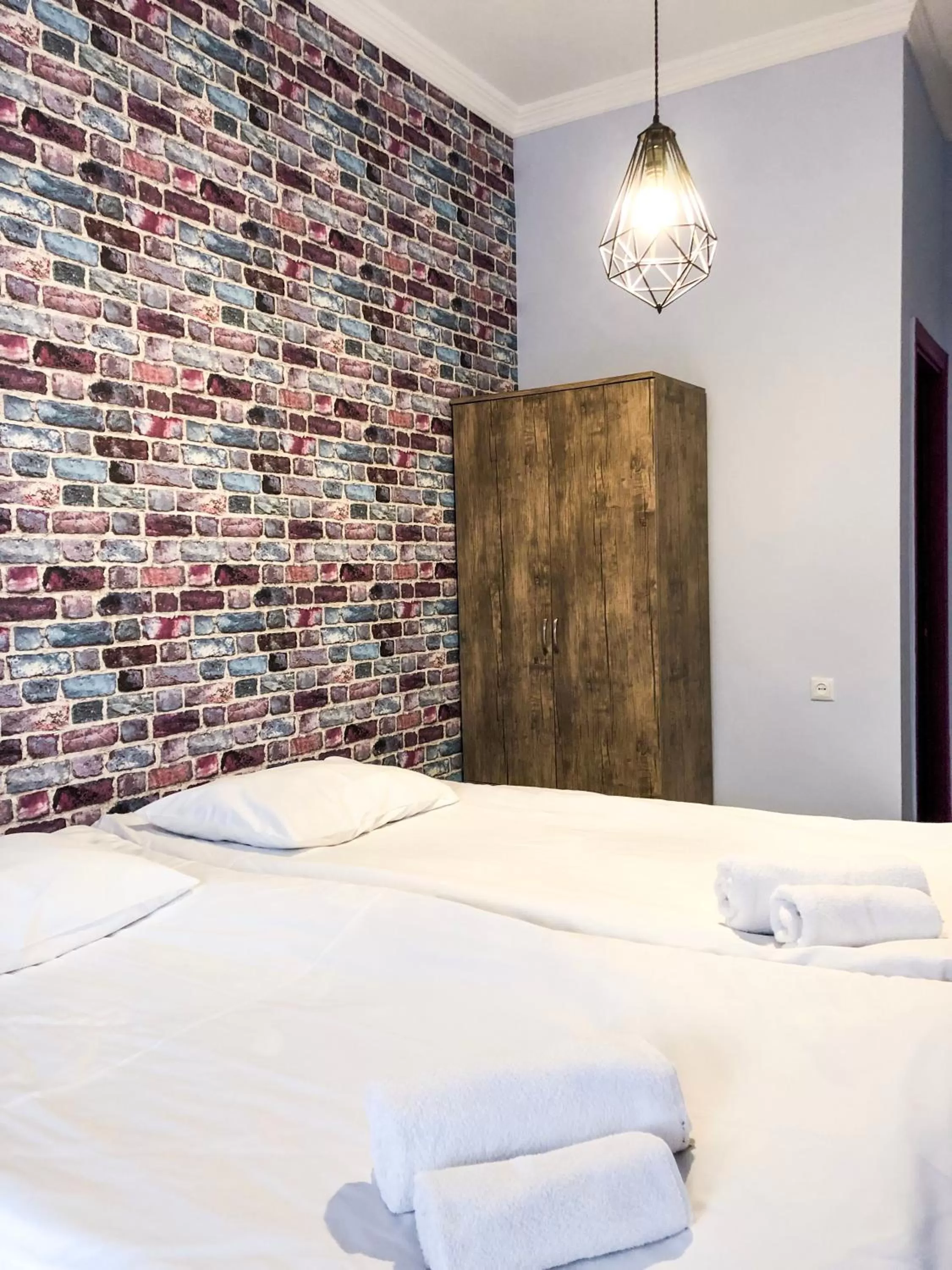 Bedroom in Check Point Hotel