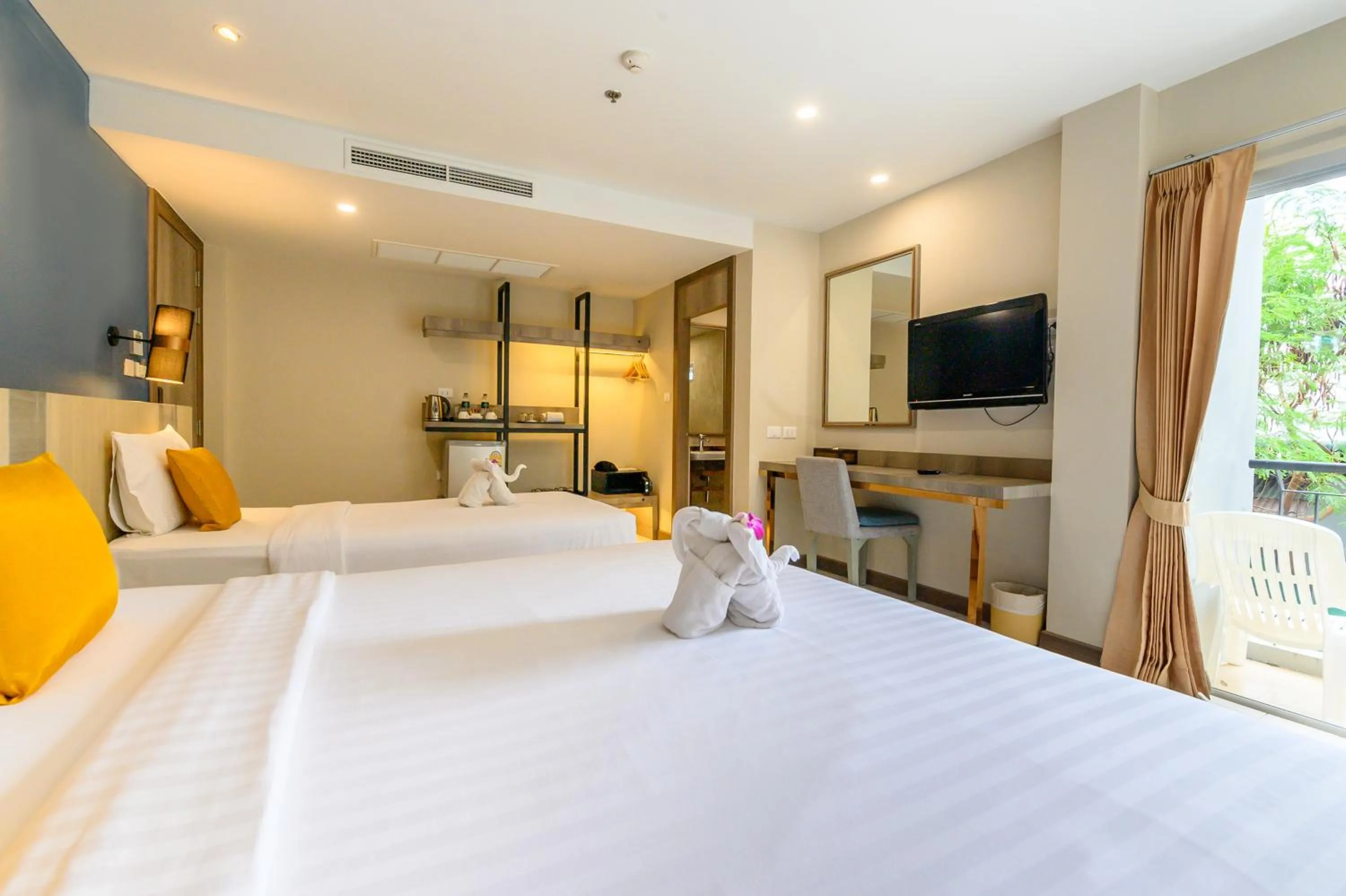 TV and multimedia, Bed in Andakira Hotel - SHA Extra Plus