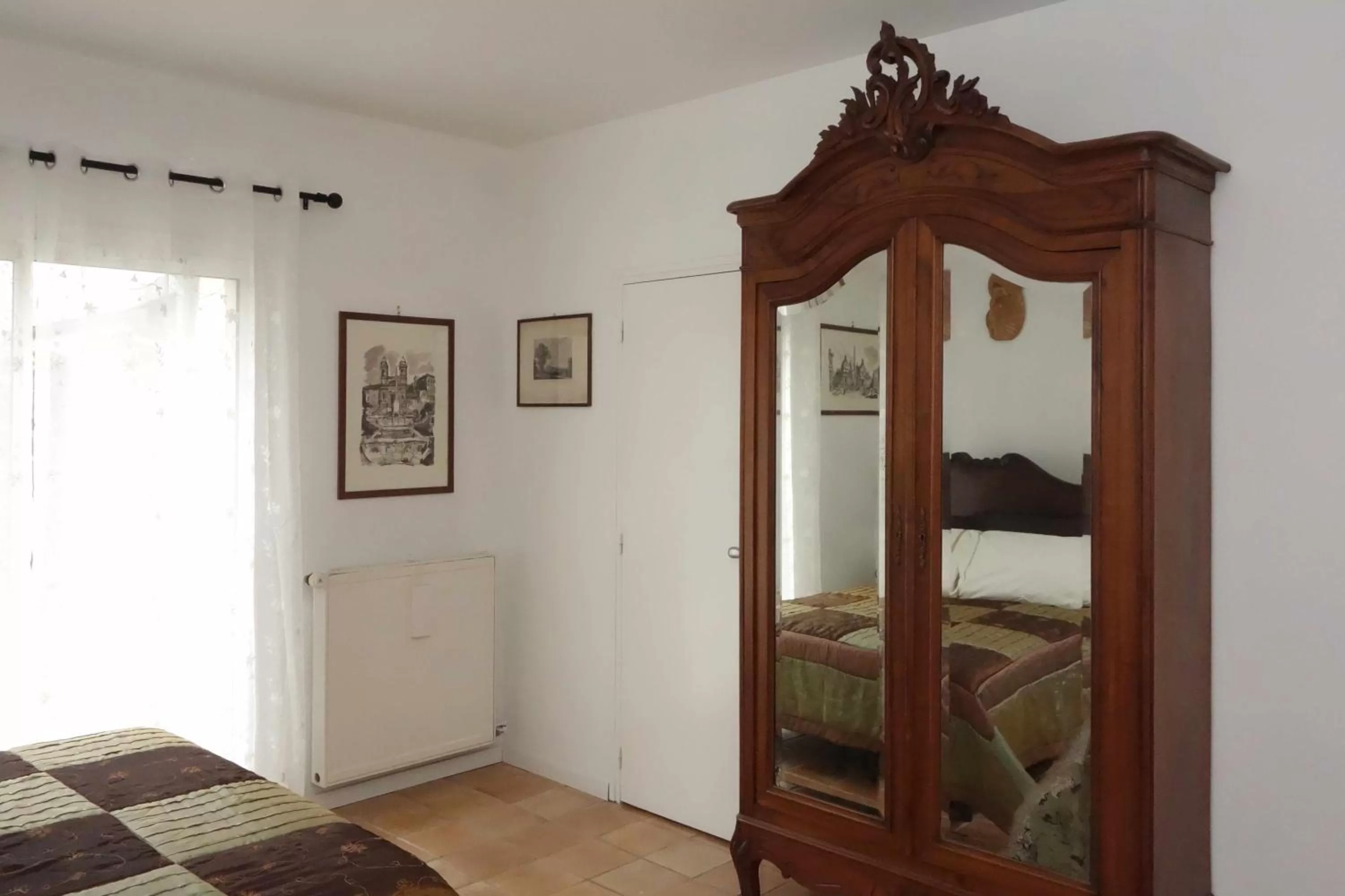 Bedroom in Chambre D'Hôtes le Phenix