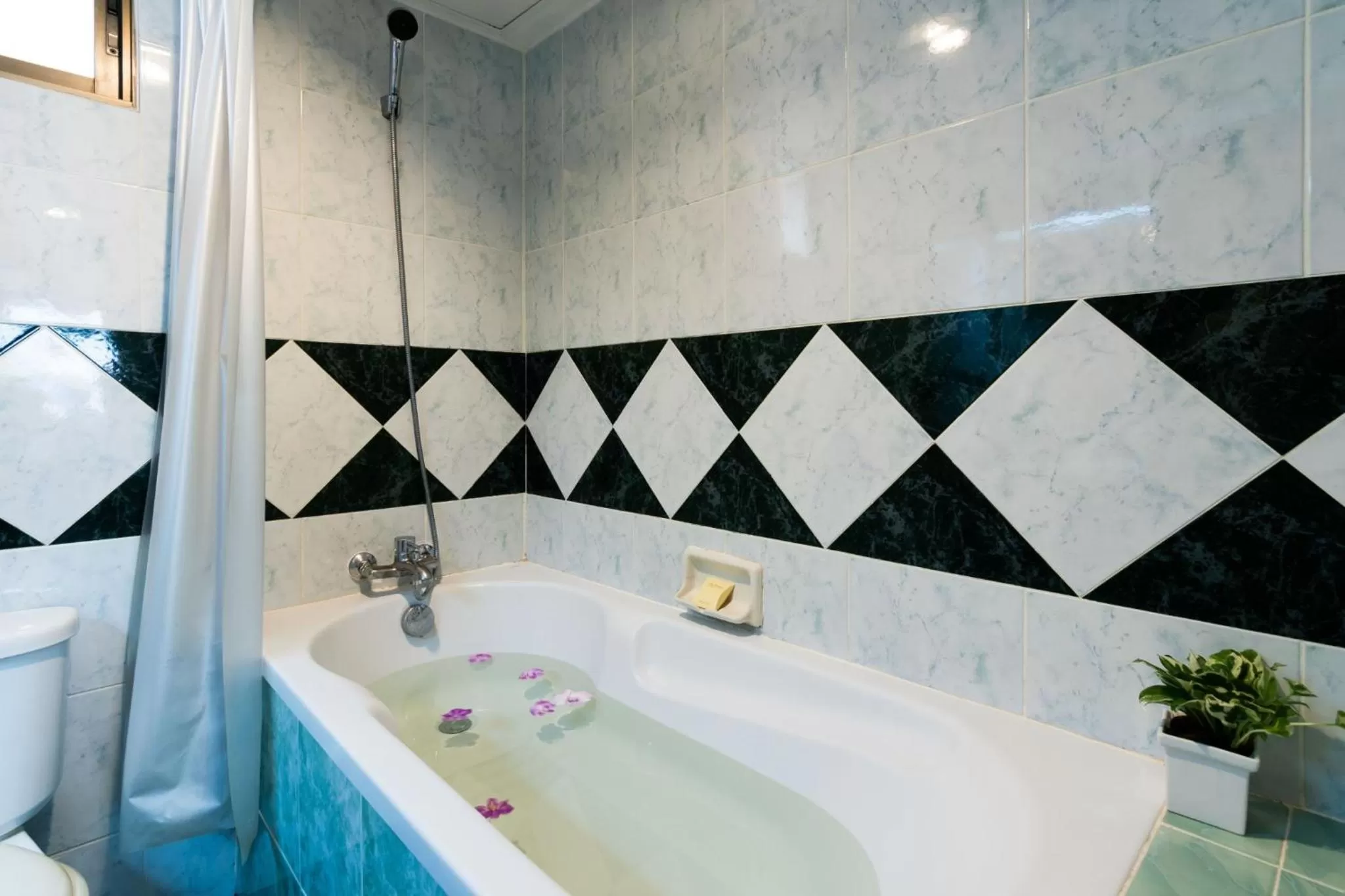 Toilet in The Residence Garden