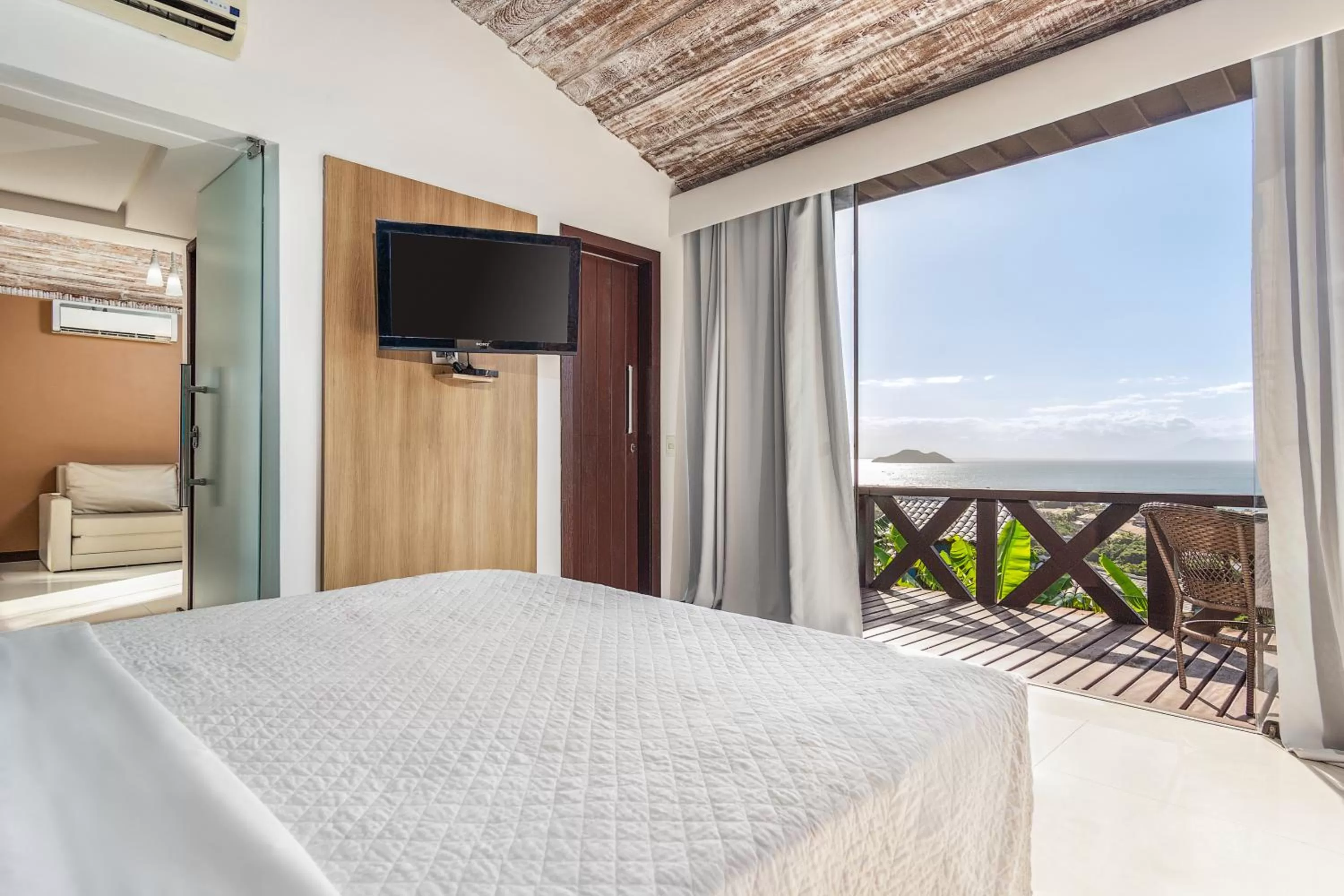 Balcony/Terrace, Bed in Costa do Sol Boutique Hotel